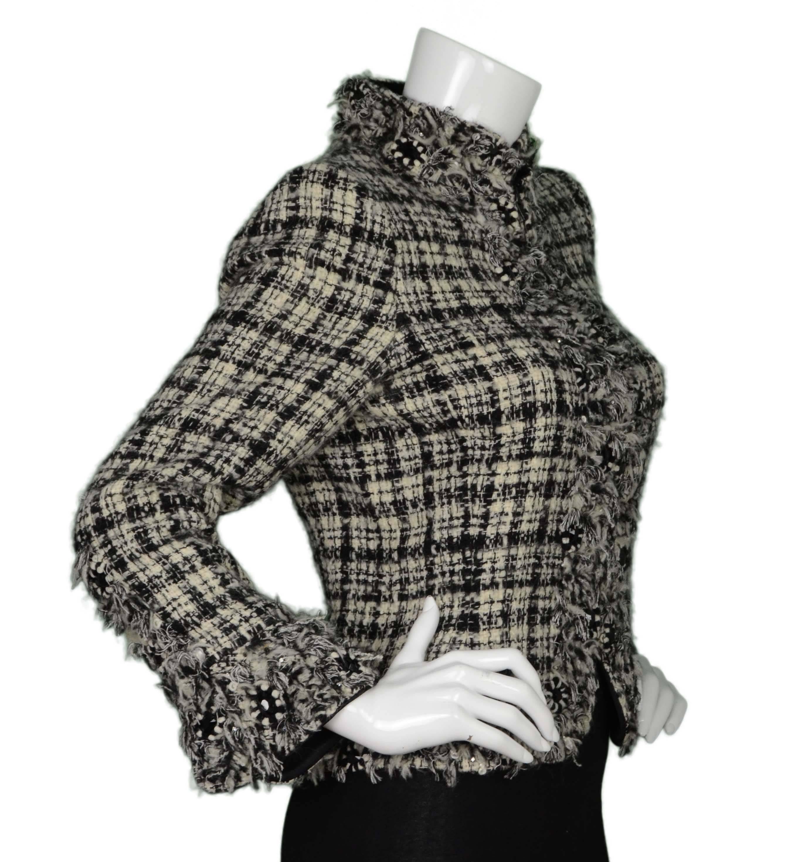 Oscar de la Renta Black & White Tweed Jacket 
Features black beads and fringe throughout trim
Made In: Italy
Color: Black and white
Composition: 86% wool, 10% mohair, 4% polyamide
Lining: Navy satin-blend textile
Closure/Opening: Zip front