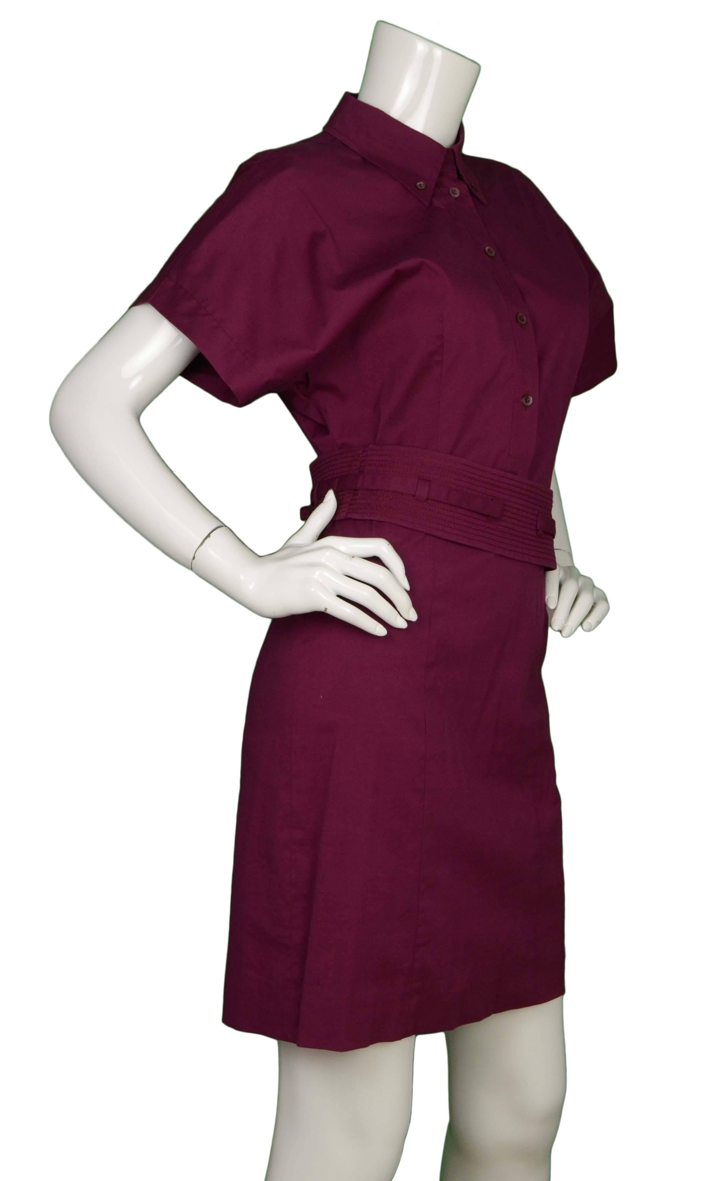 Gucci Eggplant Short Sleeve Shirt Dress 
Features waist belt
Made In: Italy
Color: Purple (eggplant)
Composition: 72% cotton, 23% polyamide, 5% elastane
Lining: None
Closure/Opening: Side zipper and front button down closure
Exterior Pockets: