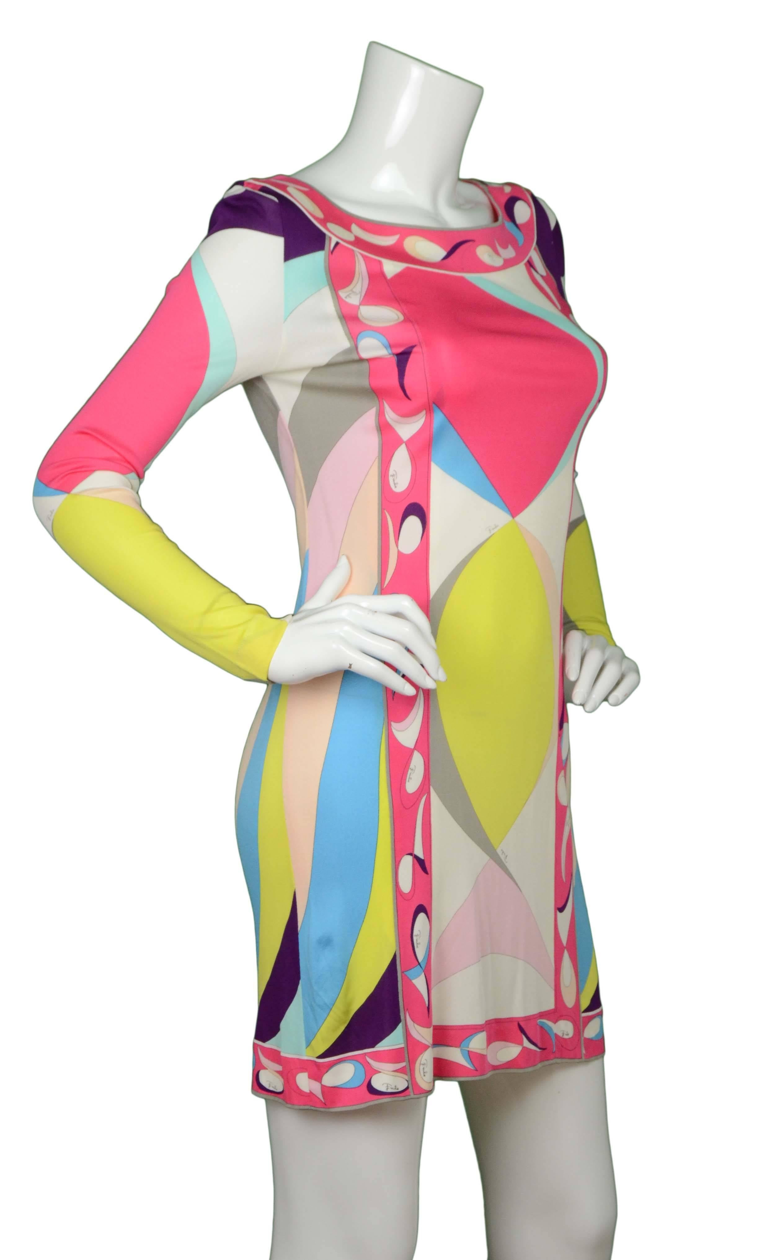 Emilio Pucci Multi-Colored Geometric Shift Dress 
Made In: Italy
Color: White, yellow, pink, blue, and purple
Composition: 100% rayon
Lining: None
Closure/Opening: Pull over
Exterior Pockets: None
Interior Pockets: None
Overall Condition: