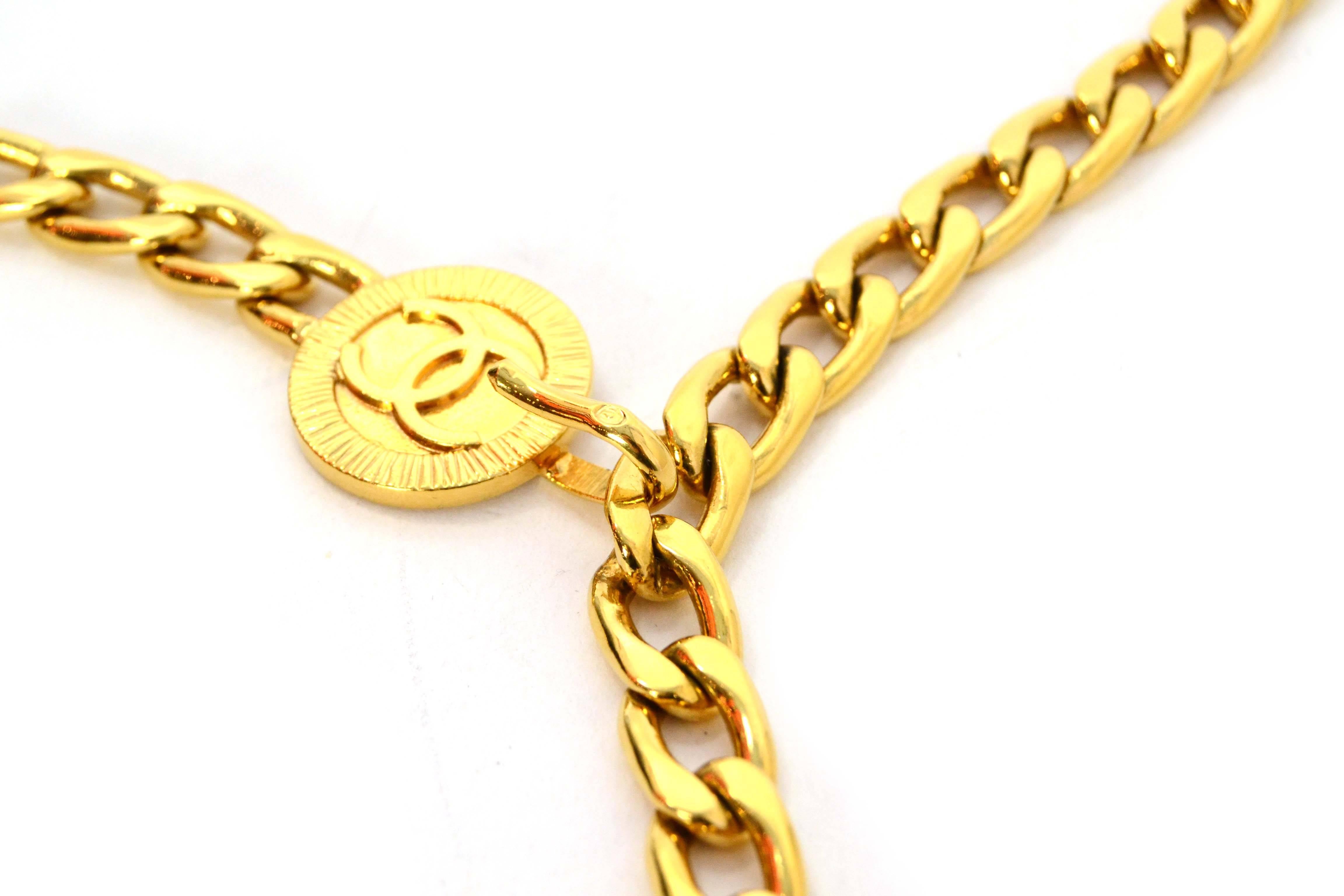 Chanel Vintage Gold Chain Link Medallion Belt 
Color: Goldtone
Materials: Metal
Closure: Hook closure
Stamp: Chanel CC
Overall Condition: Excellent vintage, pre-owned condition
Measurements: 
Length: 36