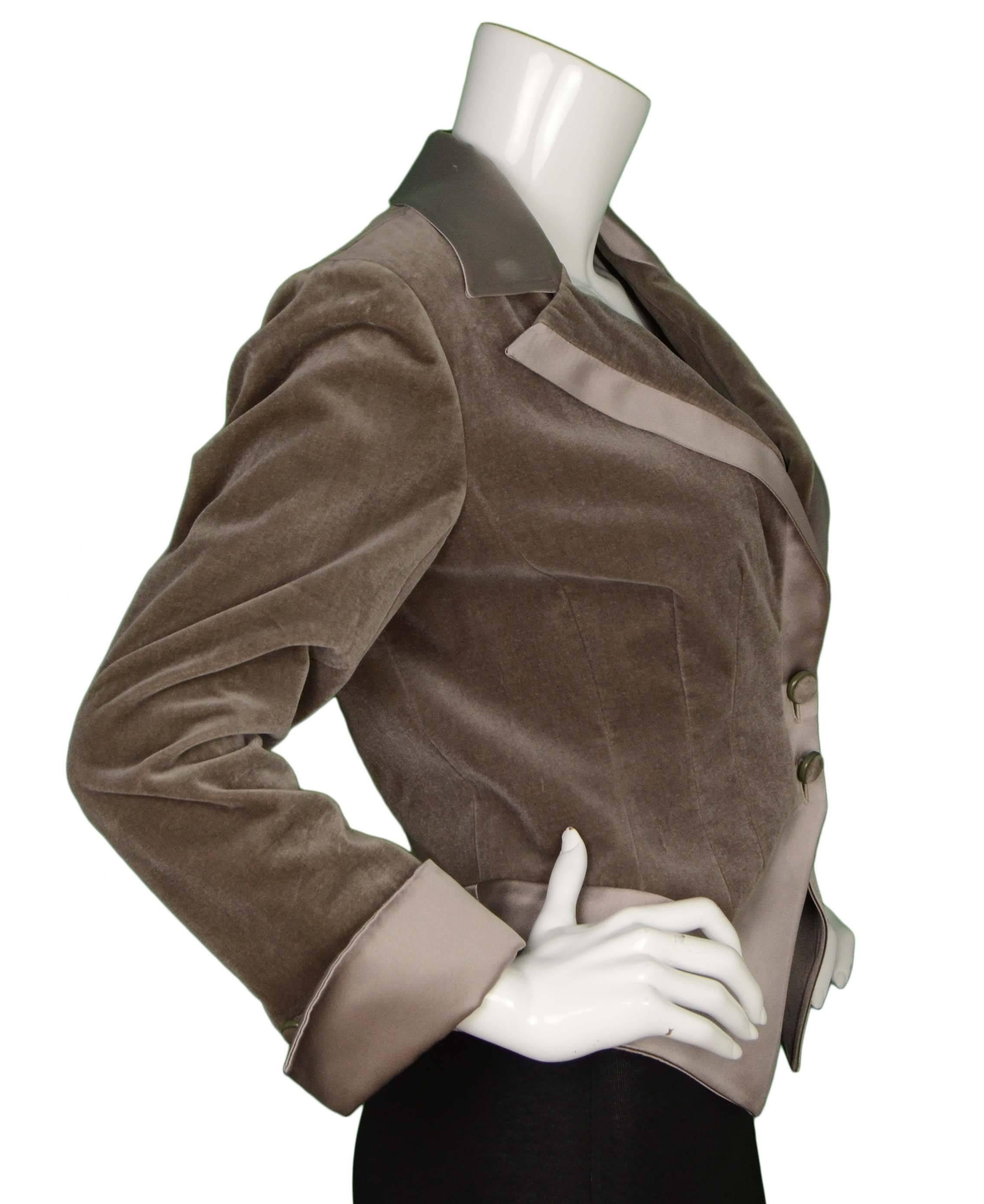 Valentino Grey Velvet Blazer 
Features silk trim throughout
Made In: Italy
Color: Grey-mauve
Composition: 70% cotton, 30% modal
Lining: Grey, 100% polyester
Closure/Opening: Front double button closure
Exterior Pockets: None
Interior