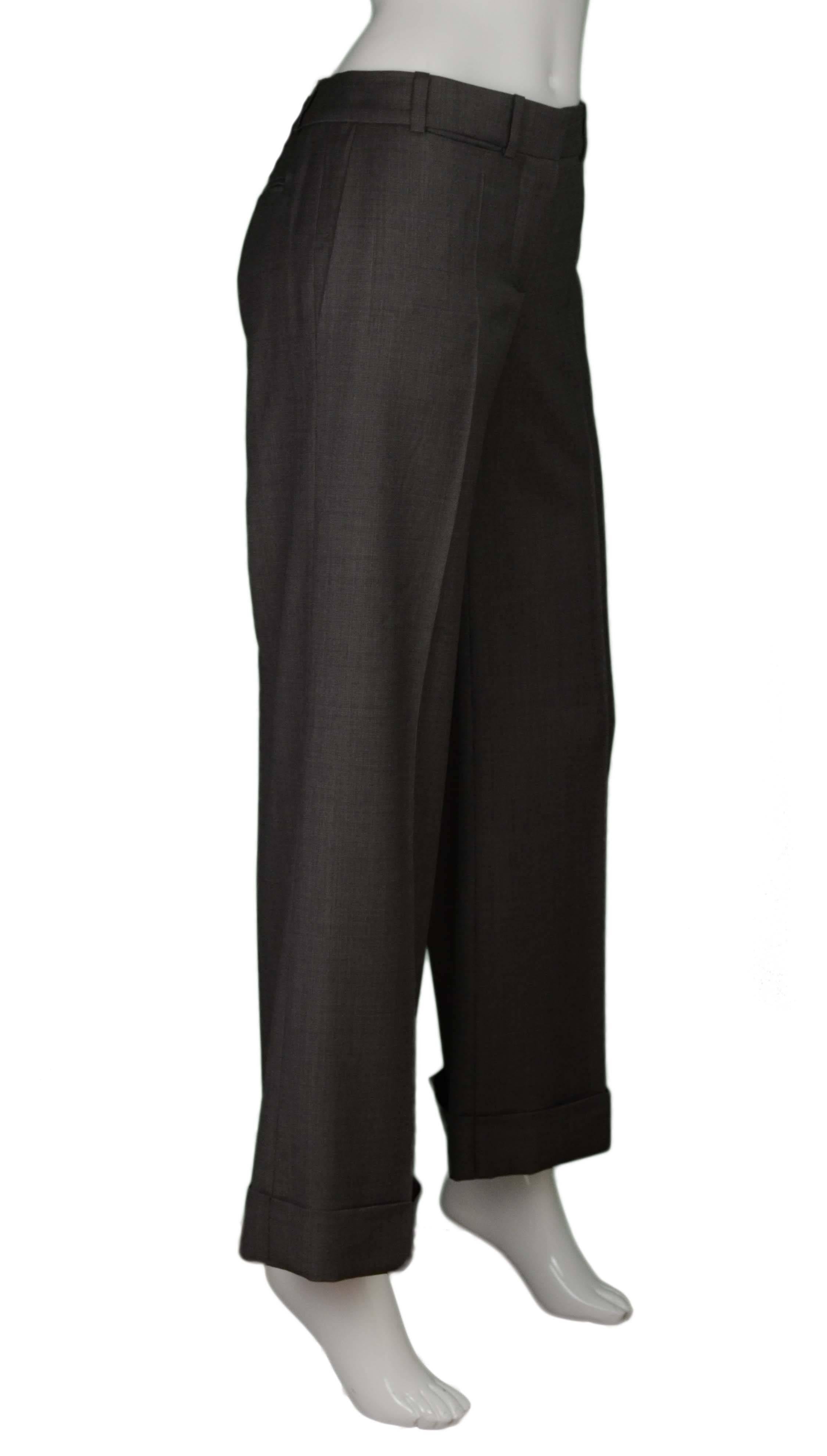 Chloe Grey Wool Wide Leg Pants 
Features wide cuffs at hemlines
Made In: France
Color: Grey
Composition: 100% wool
Lining: 100% cotton
Closure/Opening: Front zipper and hook and eye closure
Pockets: Two hip pockets, two small slit pockets,