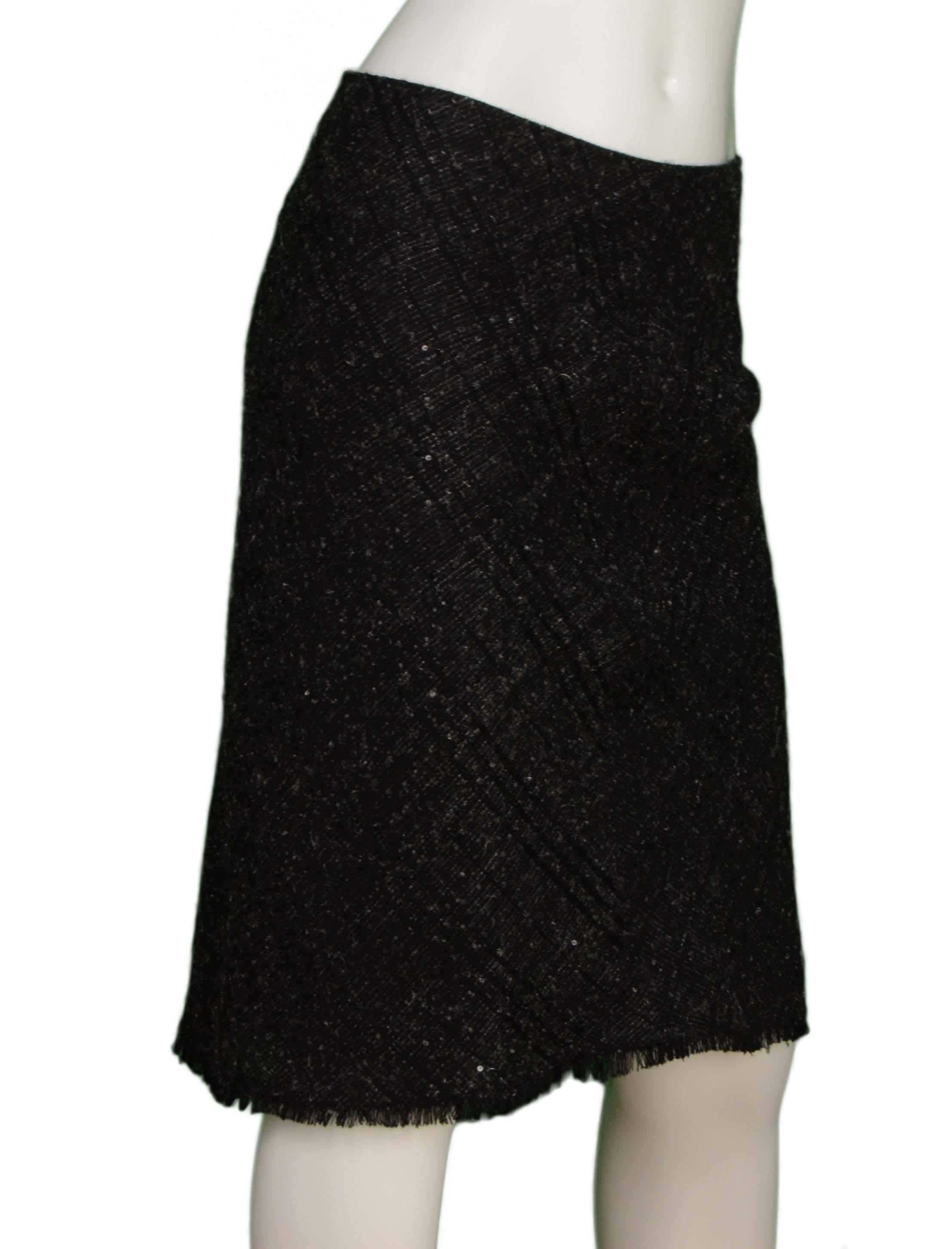 Burberry Black & Grey Wool Pencil Skirt 
Features small black sequins throughout
Made In: Italy
Color: Black and grey
Composition: 59% wool, 12% rayon, 11% polyamide, 11% mohair, 6% polyurethane, 1% cotton
Lining: Black, 93% cupro, 7%