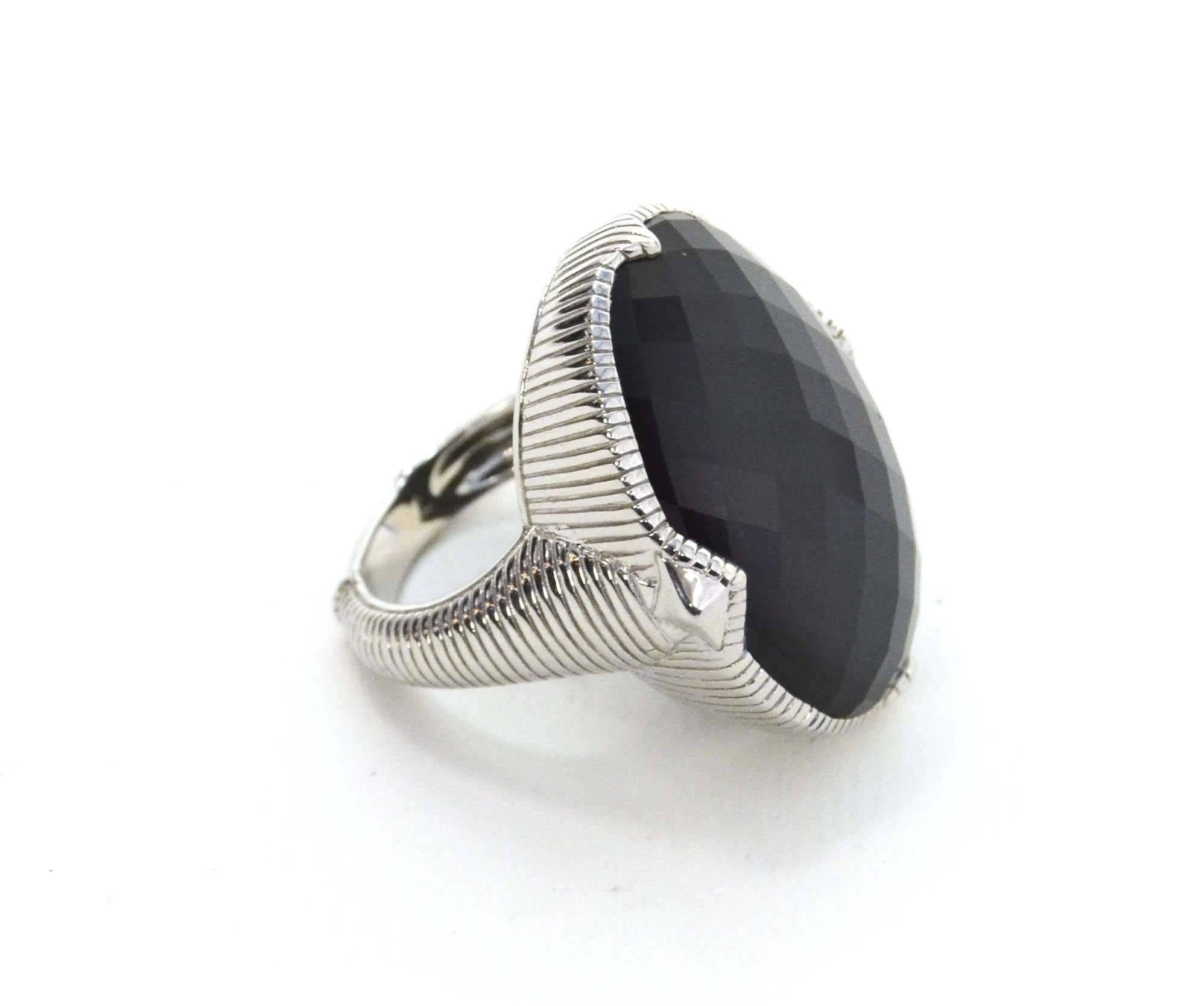 Judith Ripka Sterling Hematite Doublet Oval Ring 
Color: Silver and silver-grey
Materials: Hematite and sterling silver
Closure: None
Stamp: JR 925
Retail Price: $600 + tax
Overall Condition: Excellent 
Includes: Pouch
Size: 7
Stone: 1