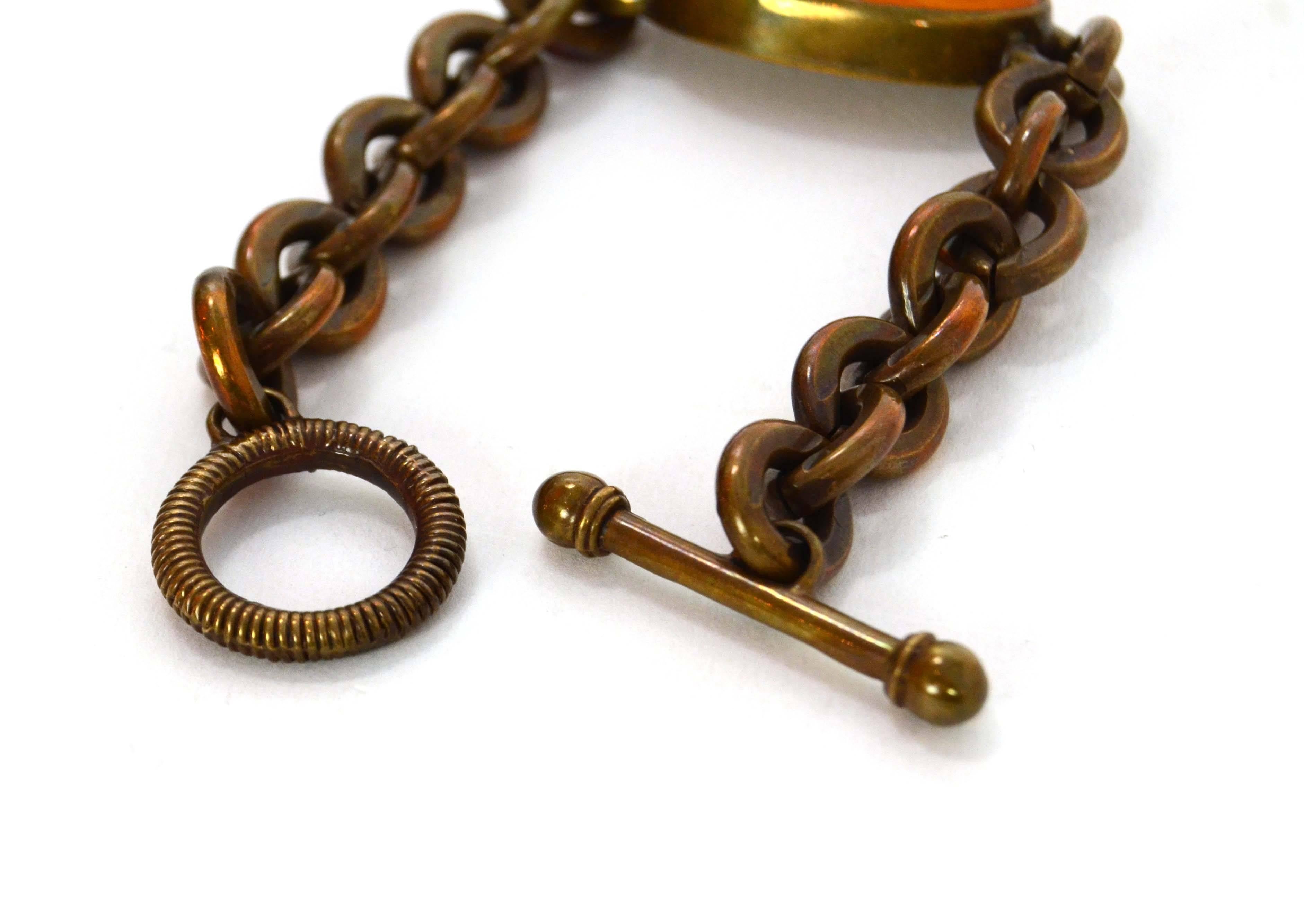 Stephen Dweck Vintage '96 Amber Stone Chain Link Bracelet 
Color: Amber and bronze
Materials: Amber stone and metal
Closure: Toggle closure
Stamp: 1996 Stephen Dweck
Overall Condition: Excellent pre-owned condition with the exception of some