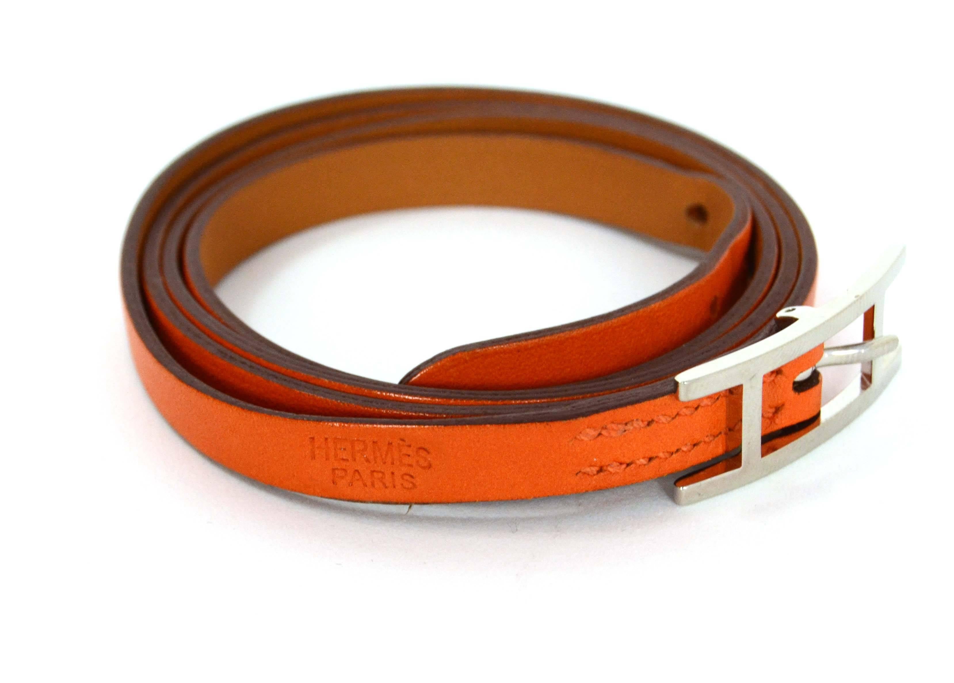 Hermes Orange Swift Leather Hapi Wrap Around Bracelet

    Made In: France

    Year of Production: 2014

    Color: Orange

    Hardware: Palladium

    Materials: Swift leather, metal

    Closure/Opening: Pull through buckle clasp

