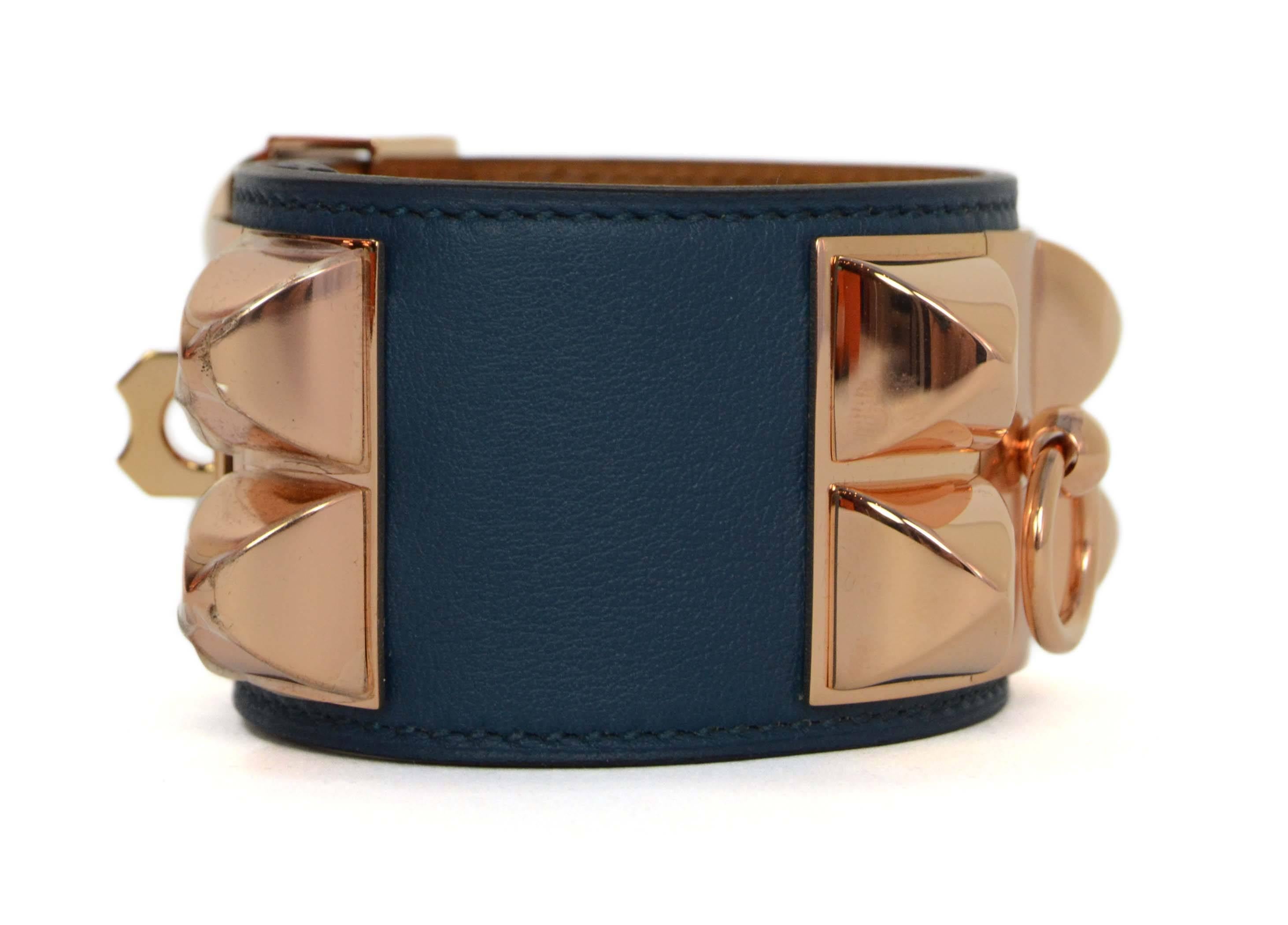 Hermes Mallard Blue Leather CDC Cuff 
Features rose gold hardware
Made In: France
Year of Production: 2015
Color: Blue mallard and rose gold
Hardware: Rose goldtone
Materials: Leather and metal
Closure: Stud and notch closure with sliding