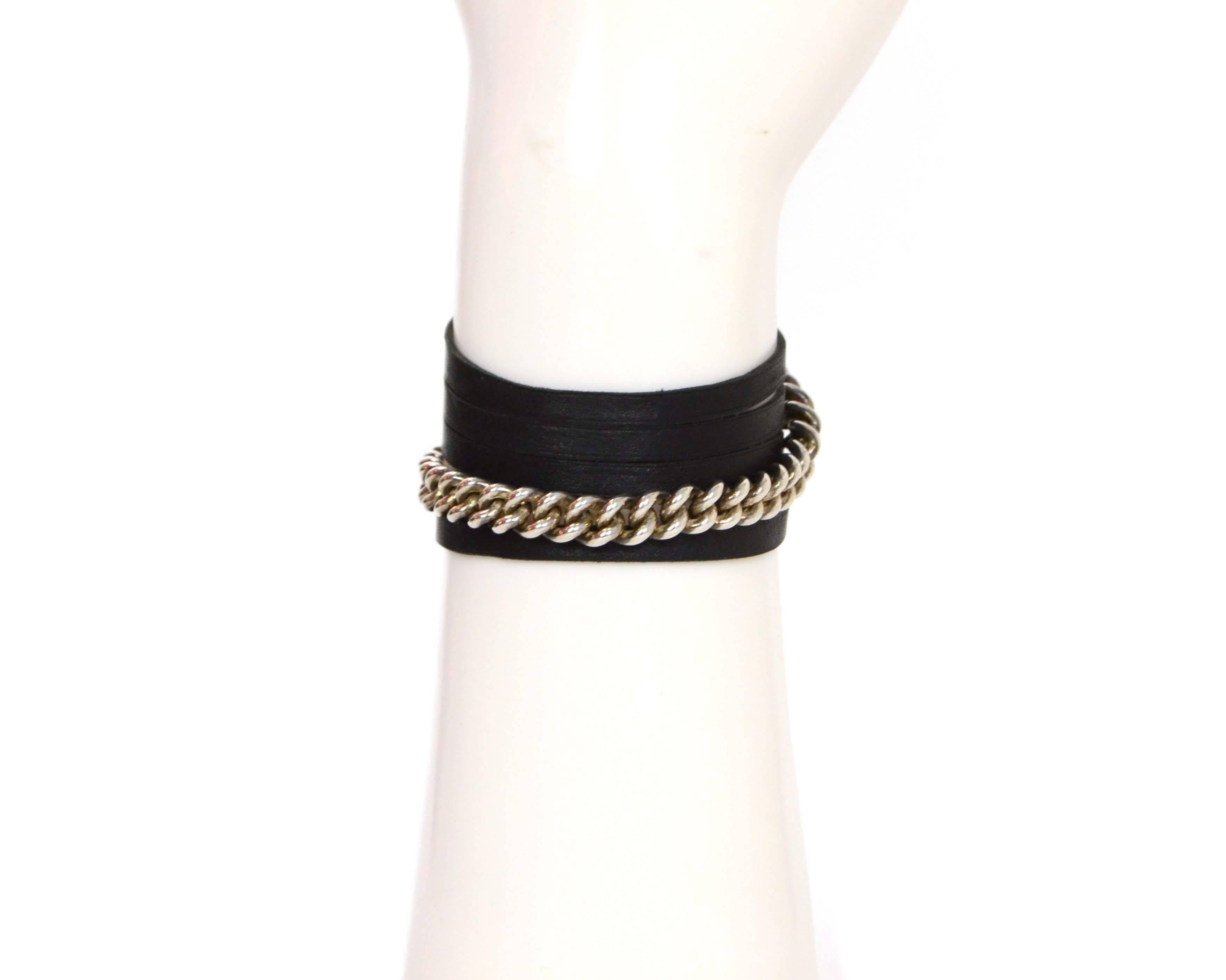 Hermes Silver & Black Leather Wrap Bracelet/Necklace
Color: Silvertone and black
Materials: Metal and leather
Closure: Tie closure
Overall Condition: Excellent pre-owned condition
Measurements: 
Total Length: 37.5