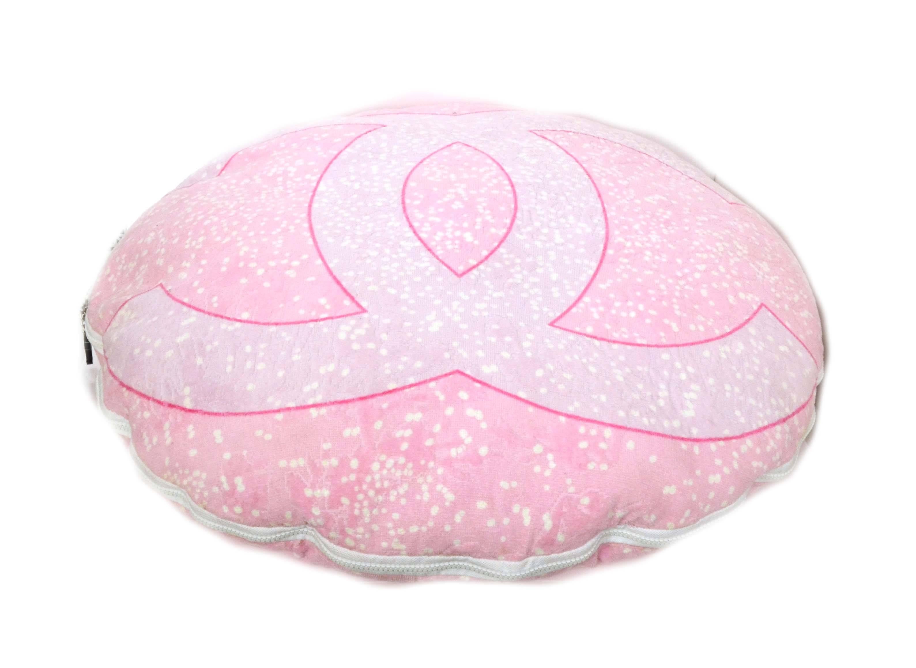 Chanel Pink & White Terrycloth Floor Cushion/Pillow 
Features black resin CC zipper pulls
Color: Light pink, dark pink and white
Composition: Believed to be a terrycloth blend
Closure: Double zip around closure
Overall Condition: Very good with