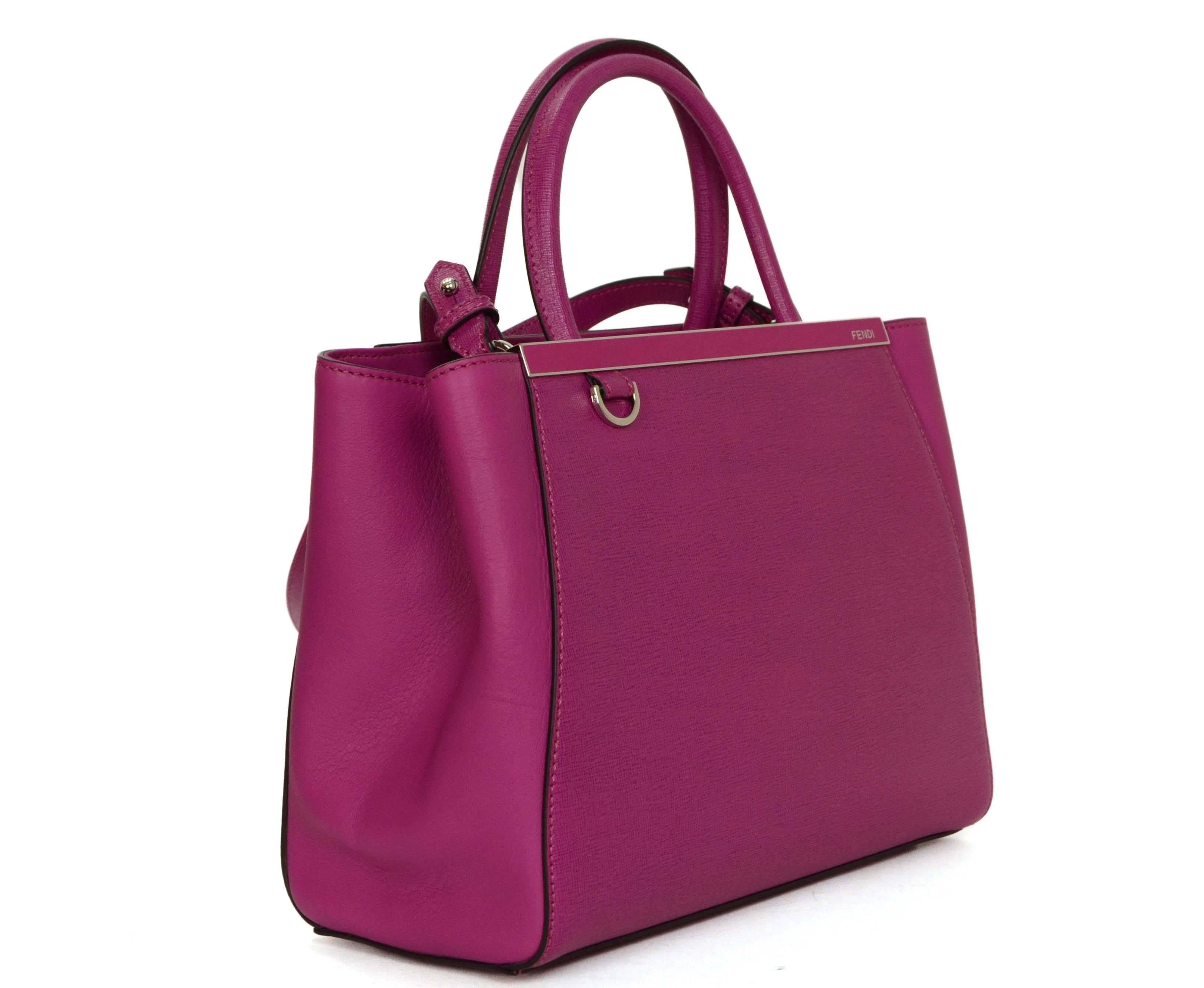 Fendi Magenta 2Jours Petite Saffiano Shopper Tote 
Features optional crossbody strap
Made In: Italy
Color: Magenta
Hardware: Silvertone
Materials: Saffiano leather
Lining: Magenta stripe textile
Closure/Opening: Open top with center magnetic