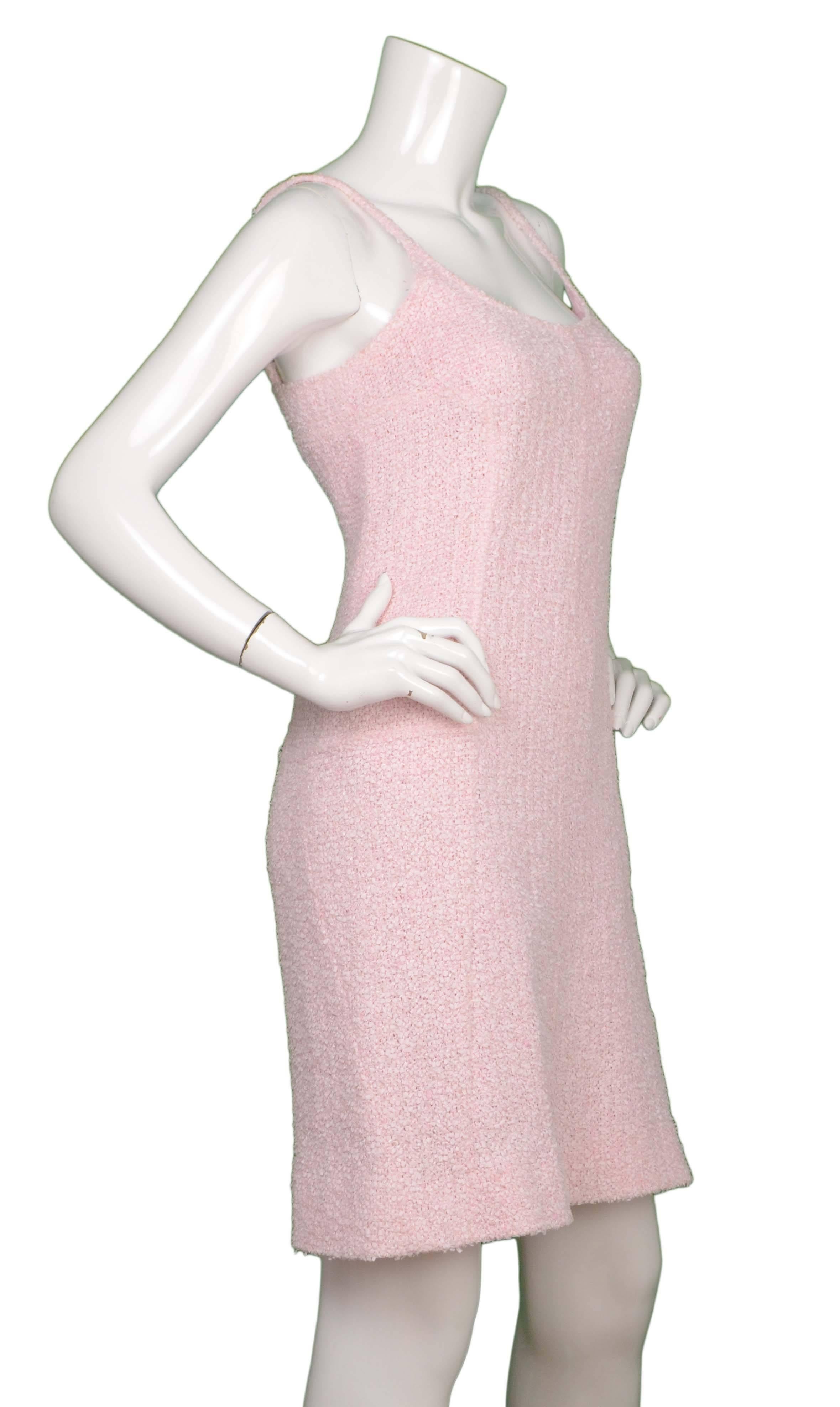 Chanel Pink Boucle Spaghetti Strap Dress 
Features cut out in back with bra style closure
Made In: France
Year of Production: 2004
Color: Pink
Composition: 55% nylon, 33% cotton, 5% rayon, 4% wool, 3% linen
Lining: Pink, 100%