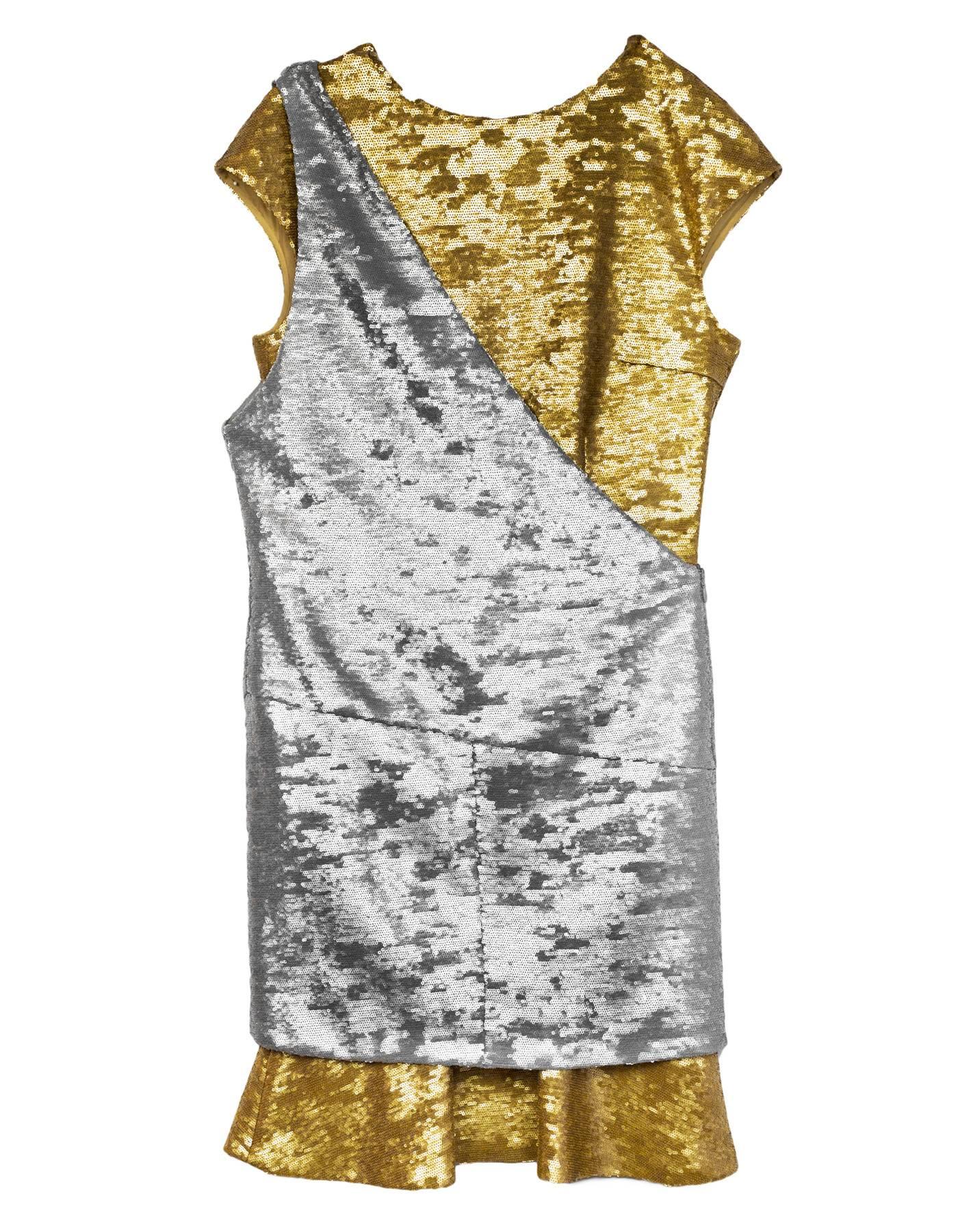 Chanel Gold & Silver Sequin 2-Piece Dress 
Features gold sequin under layer and silver sequin over layer

Made In: France
Year of Production: 2012
Color: Gold and silver
Composition: 98% polyester, 2% nylon
Lining: Gold, 100% silk
Closure/Opening: