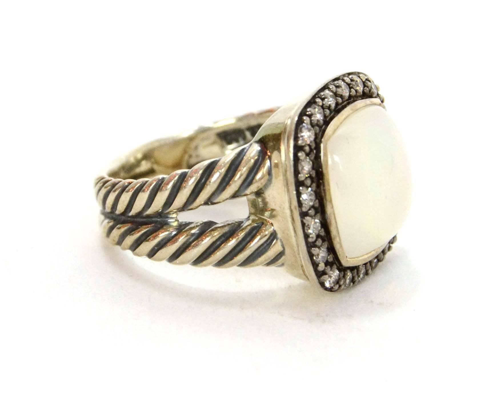 Color: Silver and ivory
•Materials: Sterling silver, diamond and moonstone
•Stamp: DY 925
•Retail Price: $1,125+ tax
•Overall Condition: Excellent pre-owned condition. Light knicks and scratches that are normal within a couple of wears.

Size: