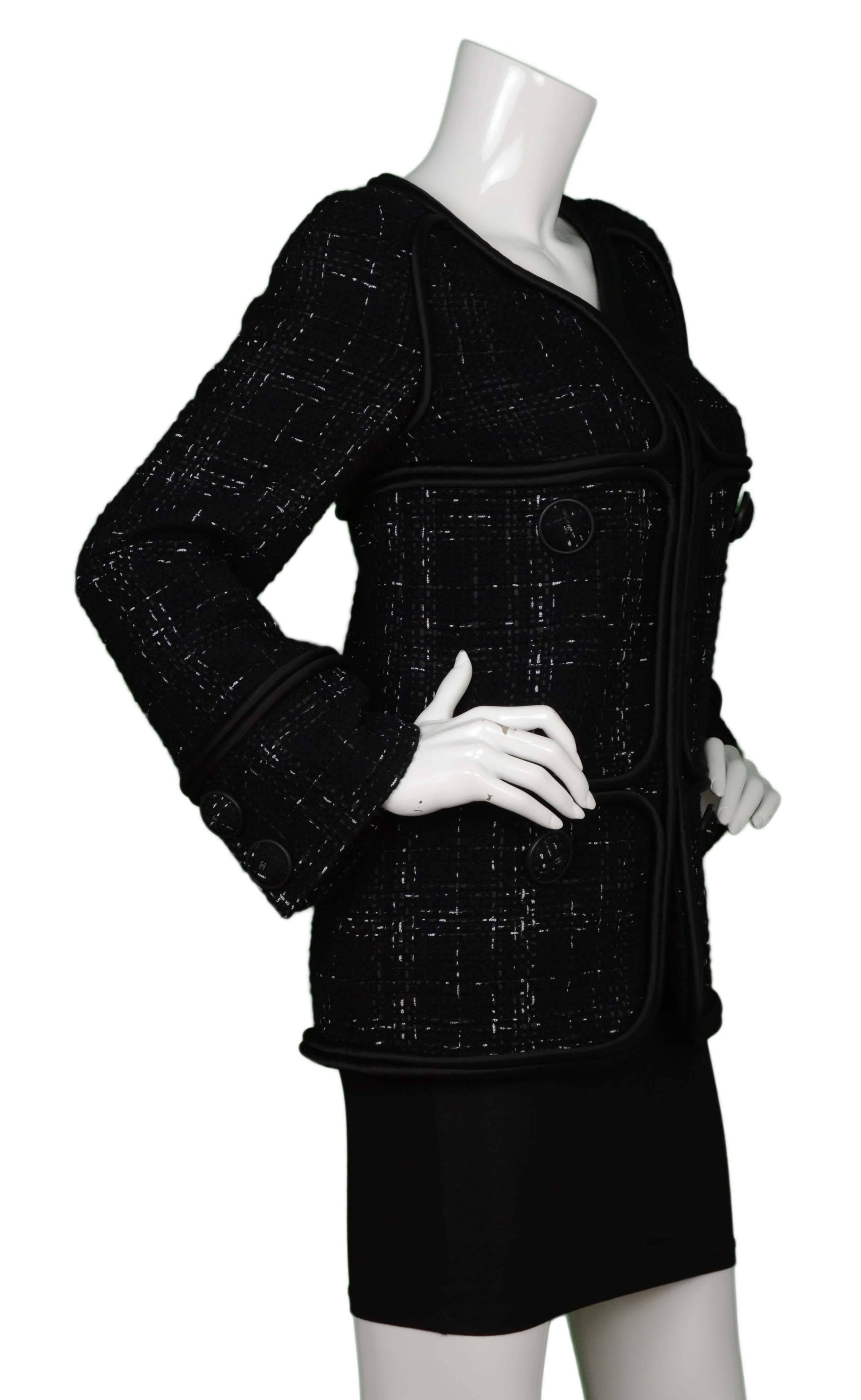 Features xl satin piping and black ribbon with Chanel in white print woven throughout jacket
Made In: France
Color: Black
Composition: 68% cotton, 21% wool, 11% polyester
Lining: Black, 100% silk
Closure/Opening: Front hook and eye