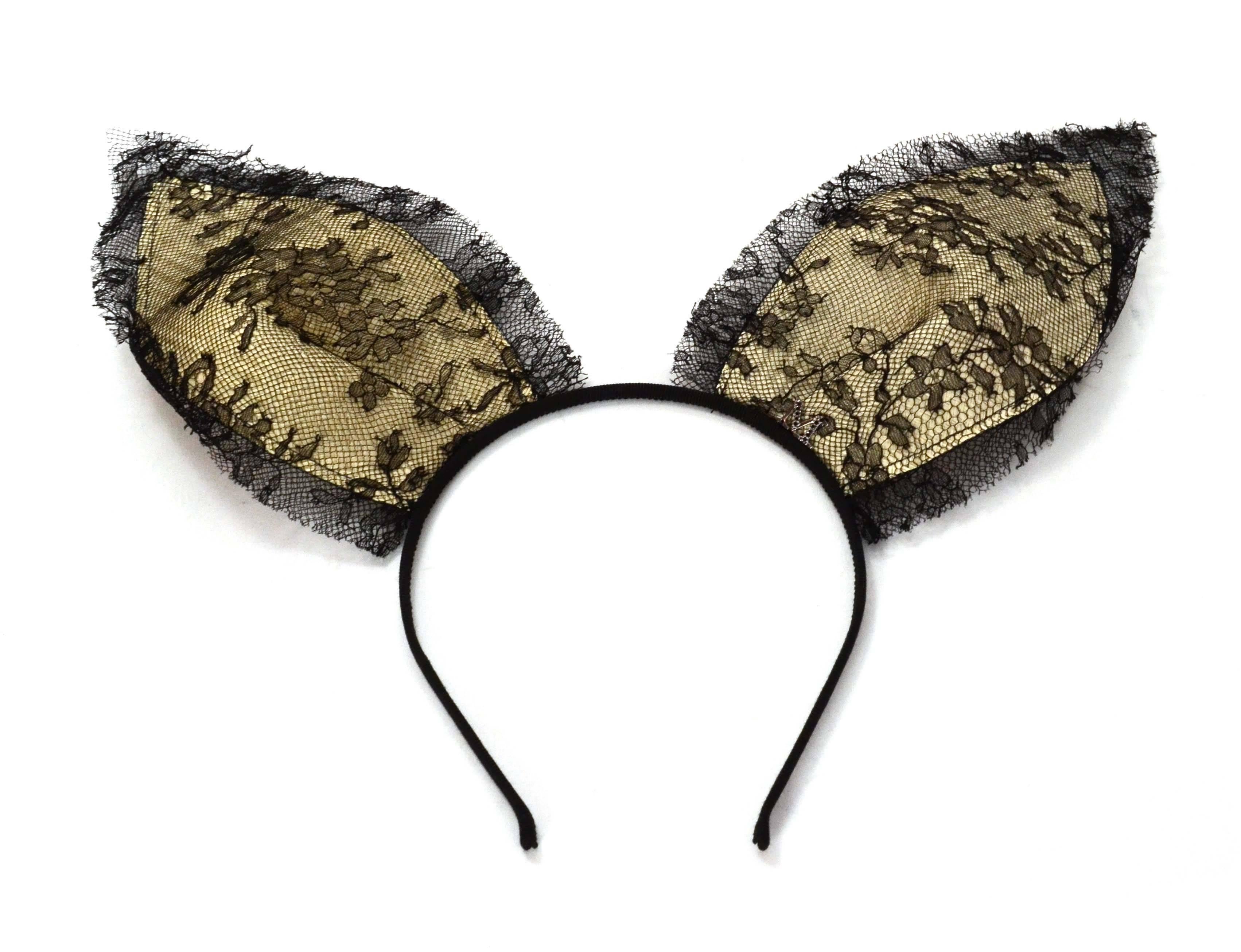 Maison Michel Black Lace 'Heidi' Bunny Ear Headband 
Lace features raw edges and ears feature a woven straw underlay
Made In: France
Color: Black and off-white
Composition: Lace, straw and grosgrain
Retail Price: $725 + tax
Overall Condition: