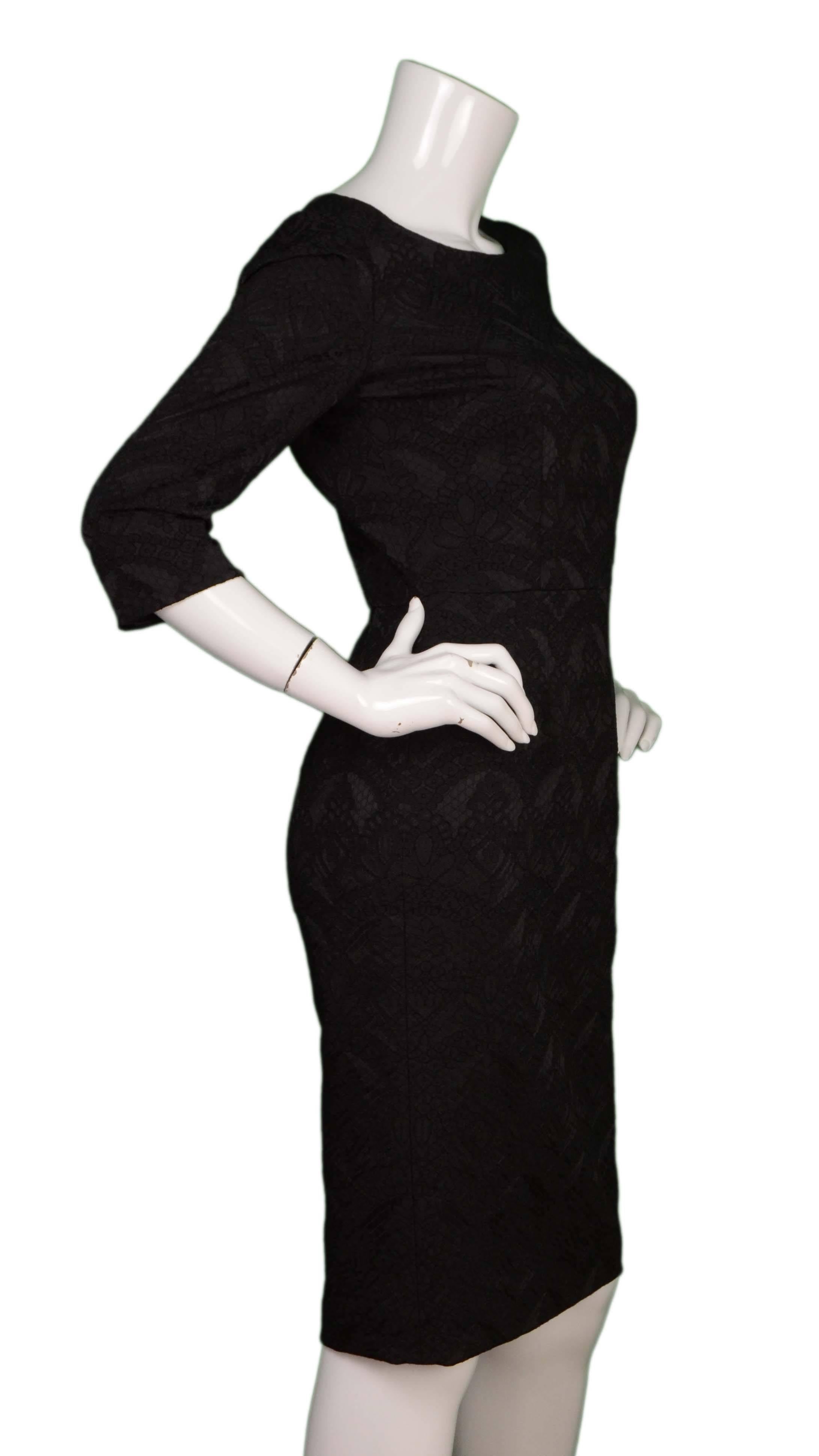 Dolce & Gabbana Black Brocade 3/4 Sleeve Dress 
Made In: Italy
Color: Black
Composition: 46% acetate, 41% polyester, 12% nylon, 1% elastane
Lining: Black, 96% silk, 4% elastane
Closure/Opening: Back center zip up closure
Exterior Pockets: