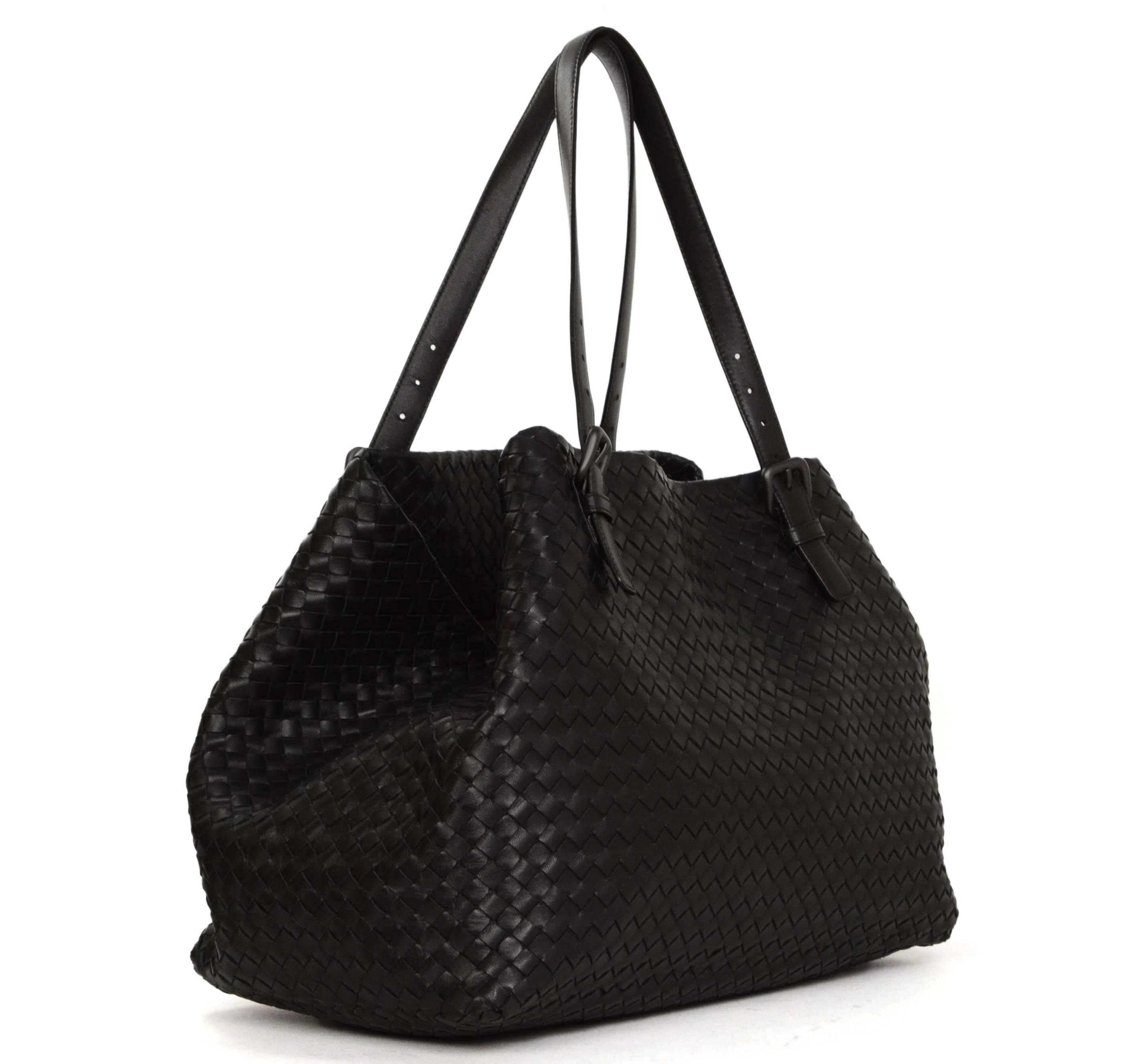 Bottega Veneta Black Woven Leather Large 'Intrecciato' Bag 
Features adjustable shoulder straps
Made In: Italy
Color: Black
Hardware: Gunmetal/black
Materials: Leather
Lining: Grey suede
Closure/Opening: Open top with latch on sides for