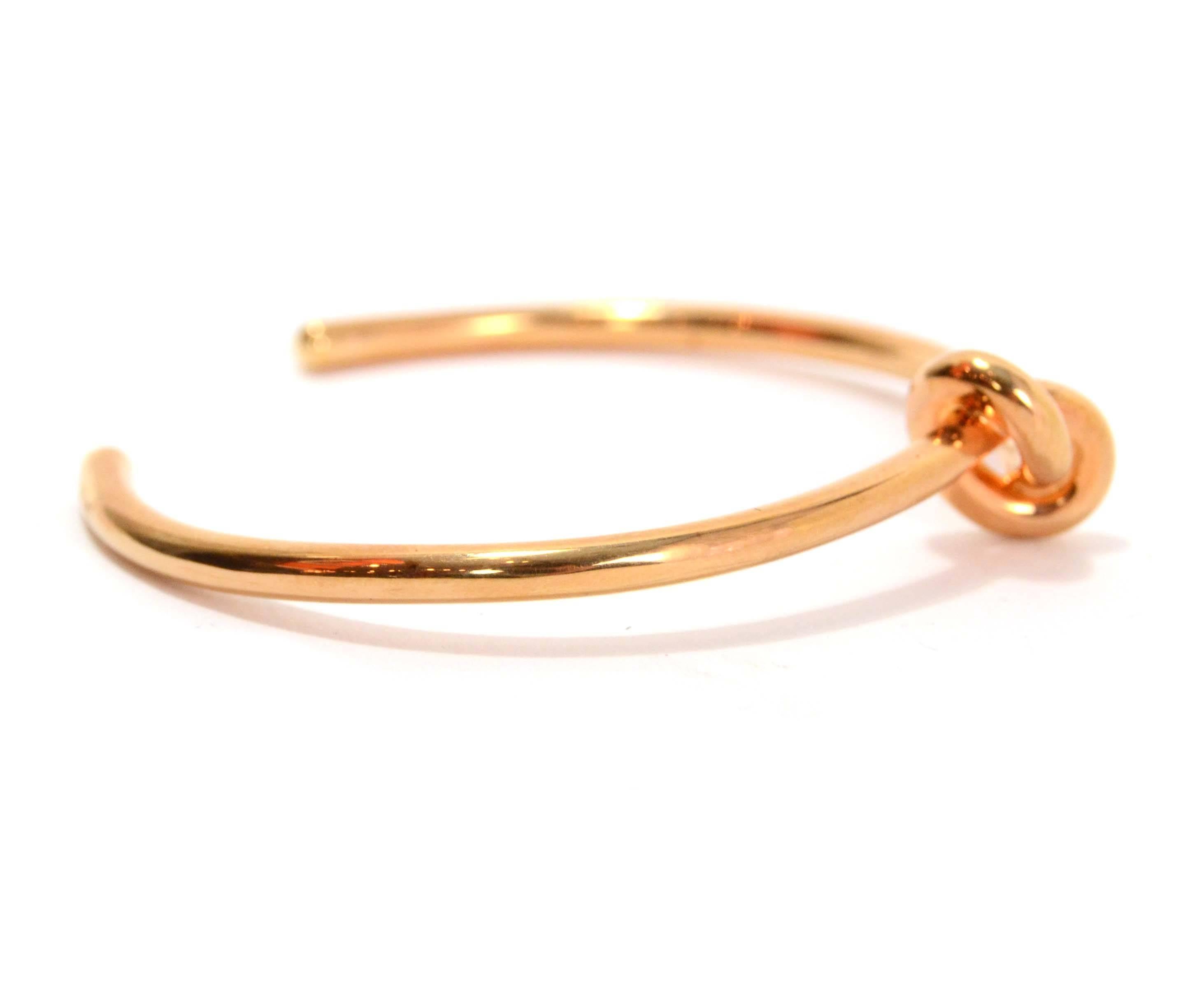 Celine Rose Gold Knot Cuff Bracelet
Made In: Italy
Color: Rose gold
Materials: Metal
Closure: None
Stamp: Celine Paris Made in Italy L
Retail Price: $620 + tax
Overall Condition: Excellent pre-owned condition
Marked Size: L
Circumference: