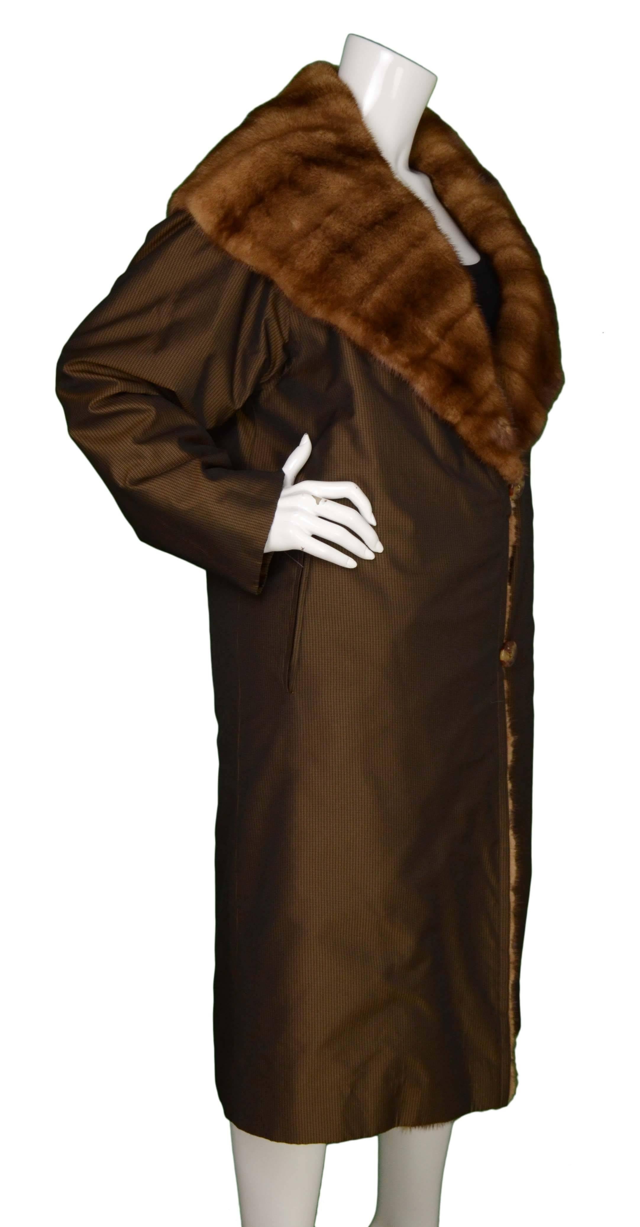 J. Mendel Brown Mink Lined Coat 
Features mini houndstooth print on exterior with oversized fur lapel

Color: Brown
Composition: Not given- believed to be a poly-blend
Lining: Brown mink
Closure/Opening: Button front closure
Exterior Pockets: