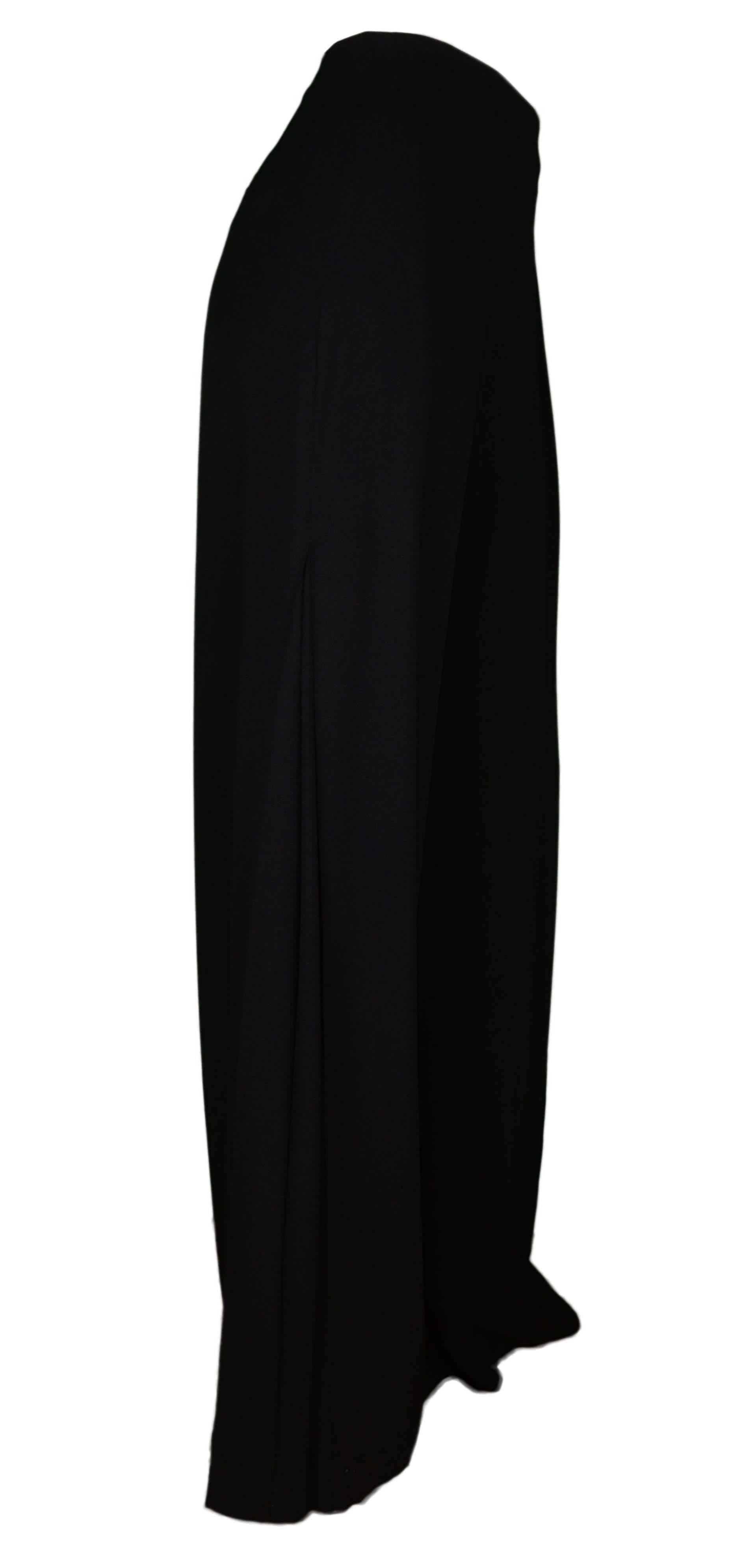 Adam Lippes Black High Waist Wide Leg Pants
Made In: U.S.A
Color: Black
Composition: 79% acetate, 21% viscose
Lining: Black, 100% silk
Closure/Opening: Side zipper
Exterior Pockets: Two back slit pockets
Interior Pockets: None
Retail Price: