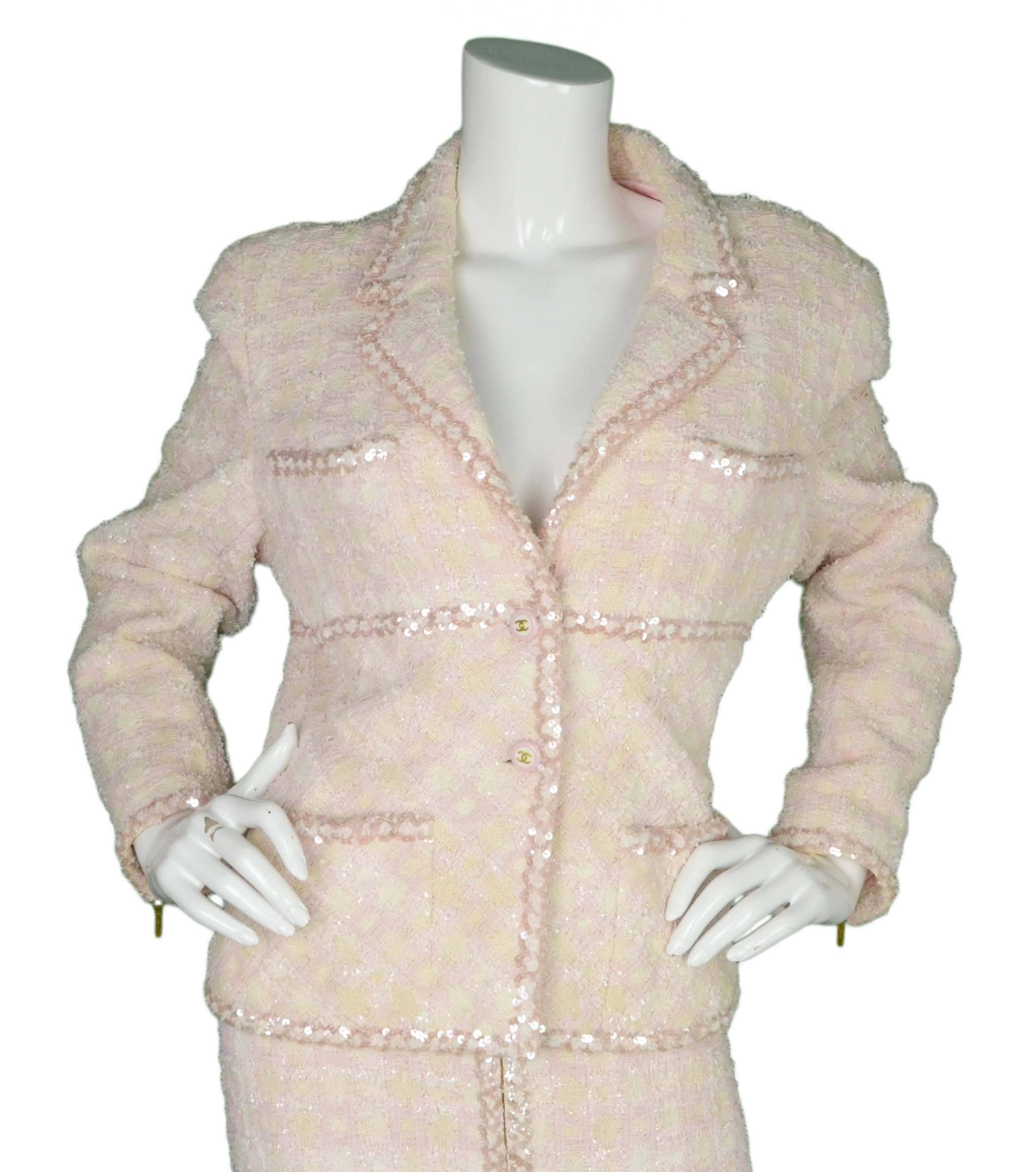 Chanel Vintage '95 Beige & Pink Tweed Skirt Suit 
Features pink sequin details throughout
Made In: France
Year of Production: 1995
Color: Pink and beige
Composition: 65% cotton, 25% nylon, 10% rayon
Lining: Pink, 95% silk, 5%