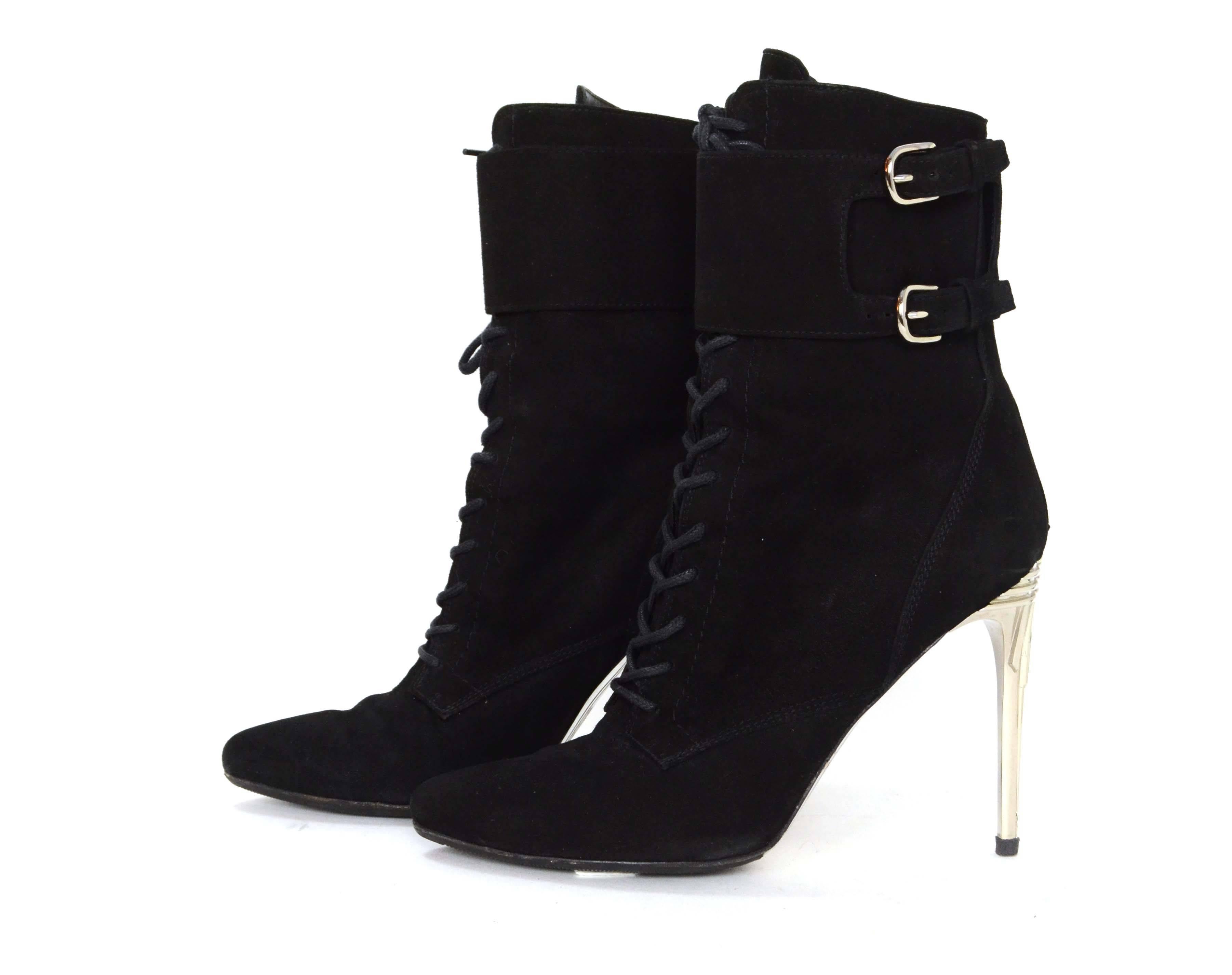 Balmain Black Suede Lace Up Booties 
Features silvertone metal detailed heels
Made In: France
Color: Black and silver
Materials: Suede and metal
Closure/Opening: Back zipper and lace up front
Sole Stamp: Balmain Made in France 40
Overall