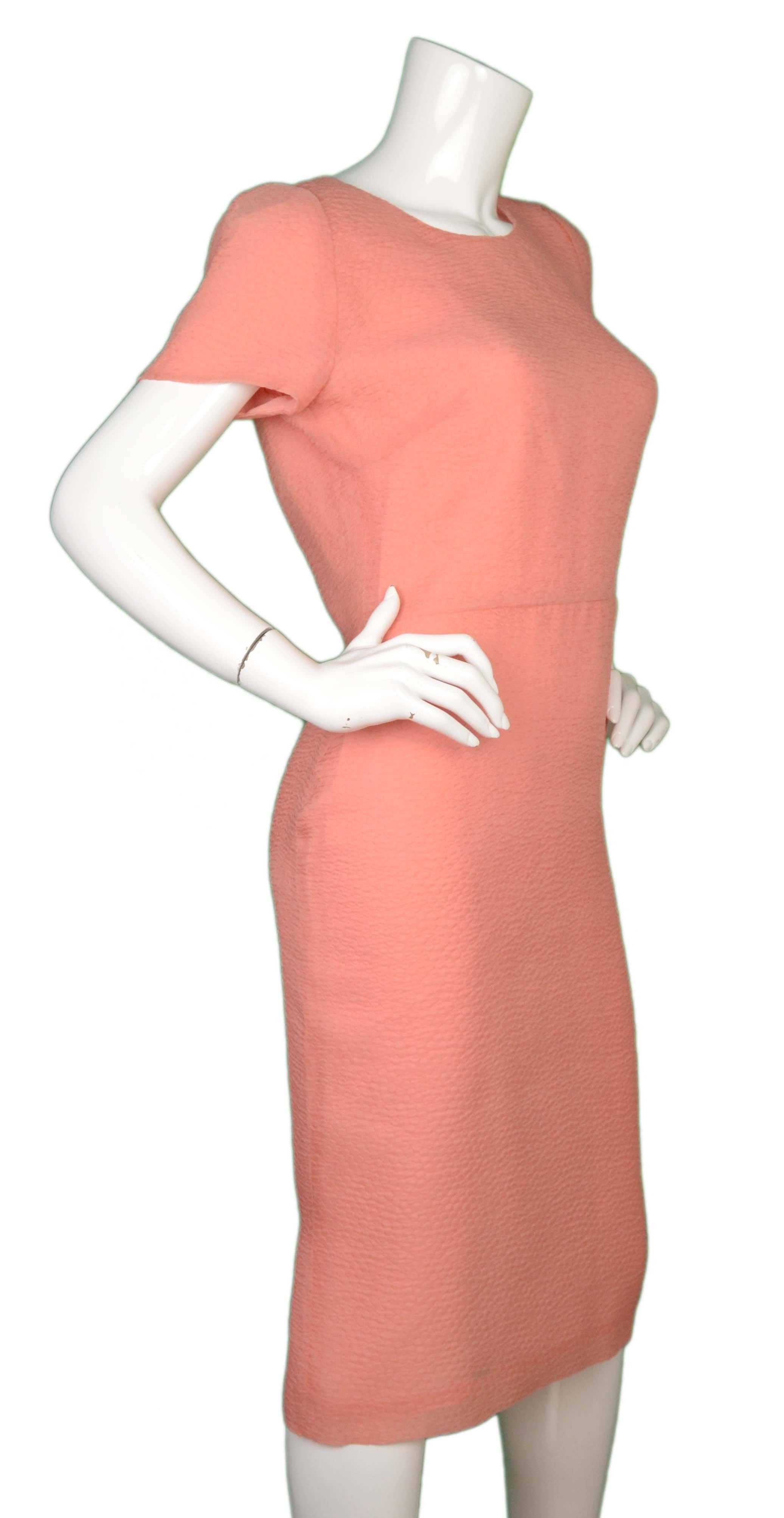 Burberry Prorsum Peach Textured Silk Short Sleeve Dress
Made In: Italy
Color: Peach
Composition: 67% silk, 33% polyamide, 
Lining: Peach, 100% silk
Closure/Opening: Back center zip up
Exterior Pockets: None
Interior Pockets: None
Retail