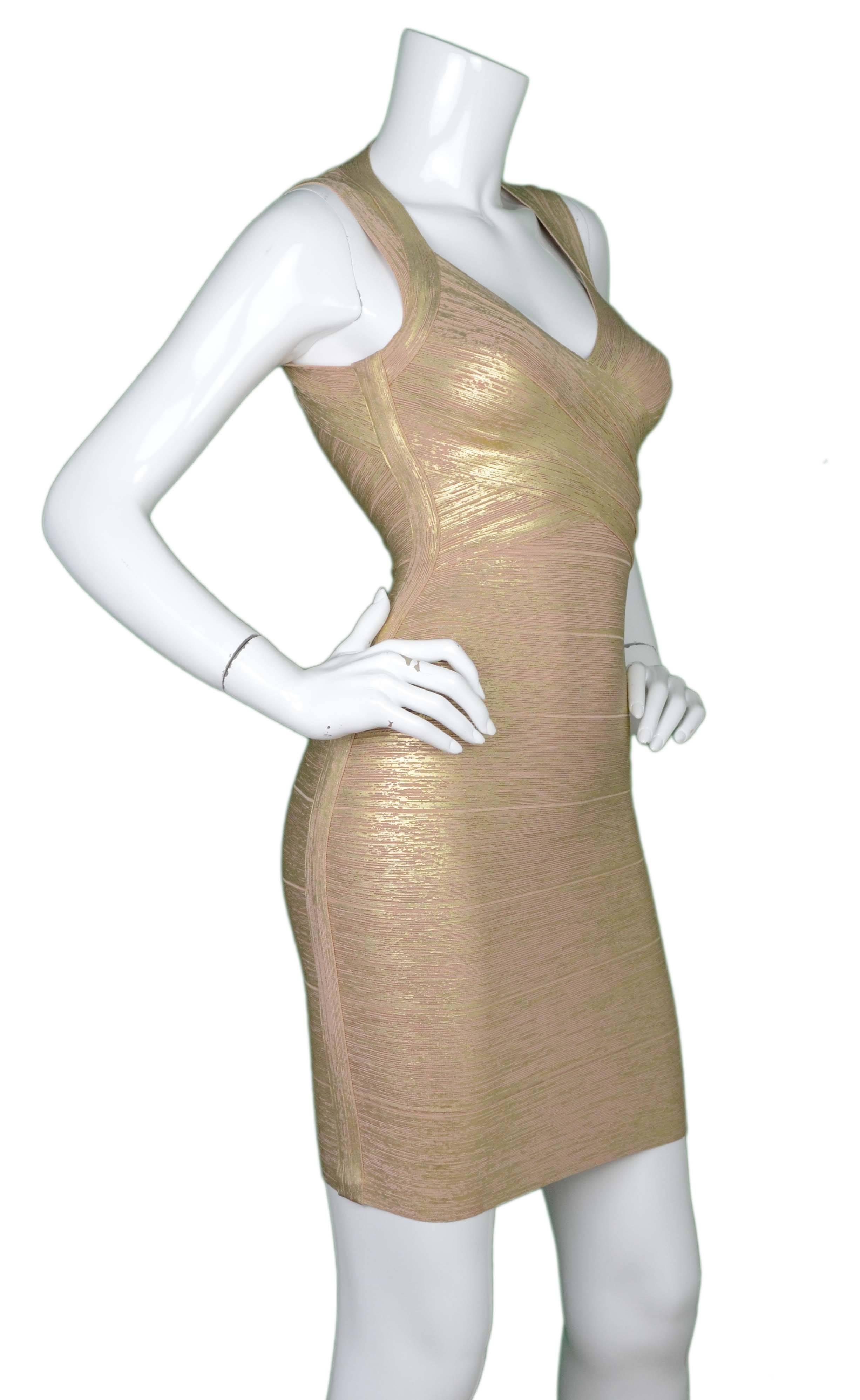 Herve Leger Champagne & Gold Painted Bandage Dress
 Features gold metallic paint over champagne color
Made In: China
Color: Champagne and gold 
Composition: 90% rayon, 1% spandex
Lining: None
Closure/Opening: Back center zipper and hook and