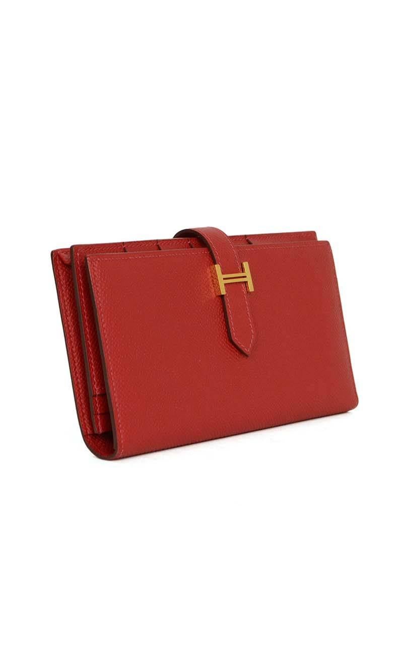 Hermes Red Rouge Casque Epsom Bearn Wallet GHW

-Made In: France
-Year of Production: 2013
-Color: Red, rouge casque
-Hardware: Goldtone
-Materials: Leather, metal
-Lining: Red leather lining
-Closure/Opening: Leather pull tab through the