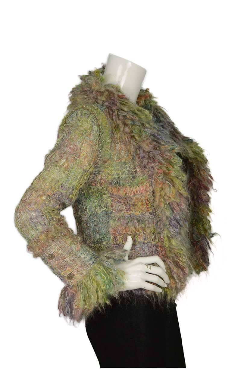 Chanel Multi-Color Mohair Jacket 
Made In: France
Year of Production: 2003
Color: Multi-colored
Composition: 79% mohair, 19% wool, 2% nylon
Lining: White, 56% polyester, 44% cotton
Closure/Opening: Front hook and eye closure
Exterior Pockets: