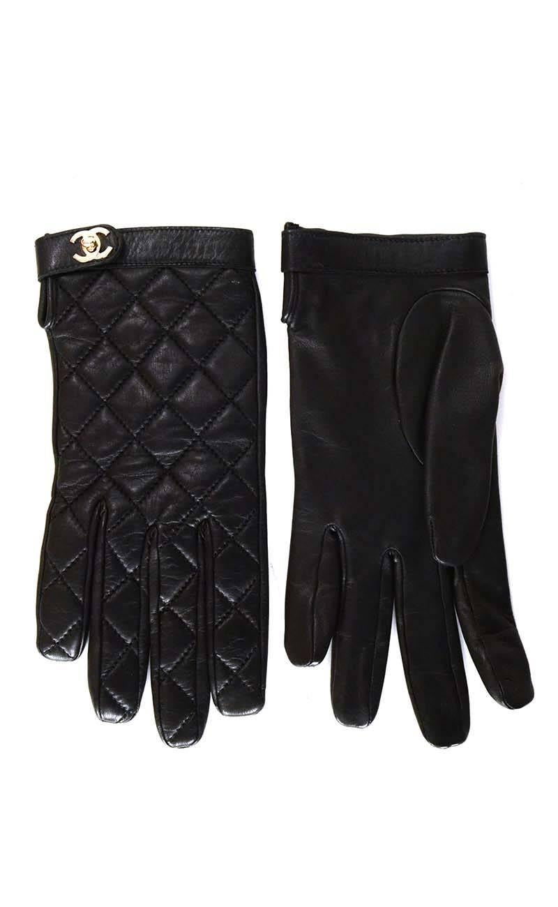 Chanel Black Quilted Lambskin Gloves 
Features silver CC twist locks at glove opening
Made In: France
Color: Black
Hardware: Silvertone
Materials: Lambskin
Stamp: Chanel CC Made in France
Overall Condition: Excellent pre-owned