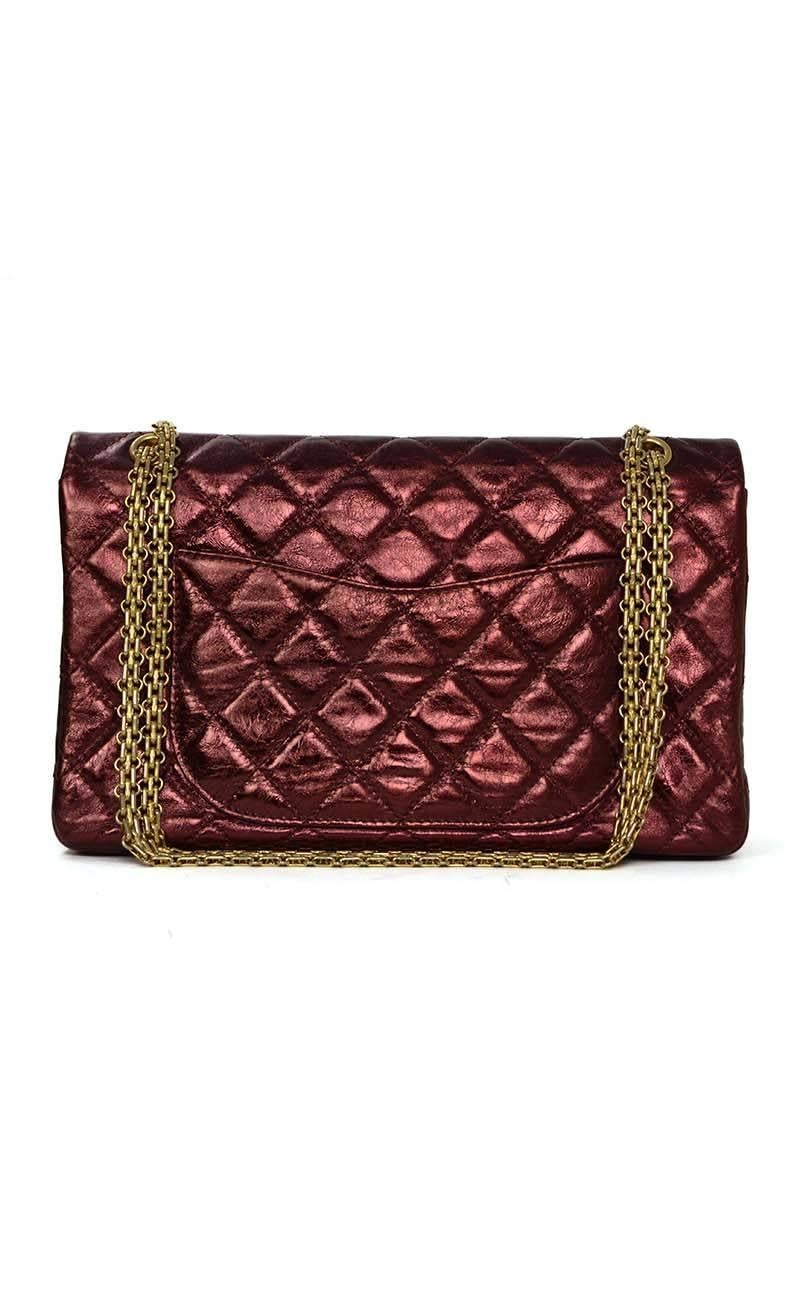 Chanel Metallic Burgundy Calfskin 227 Re-Issue 2.55 Double Flap Bag 
Features adjustable shoulder strap
Made In: France
Year of Production: 2008
Color: Metallic burgundy
Hardware: Goldtone
Materials: Distressed leather
Lining: Metallic