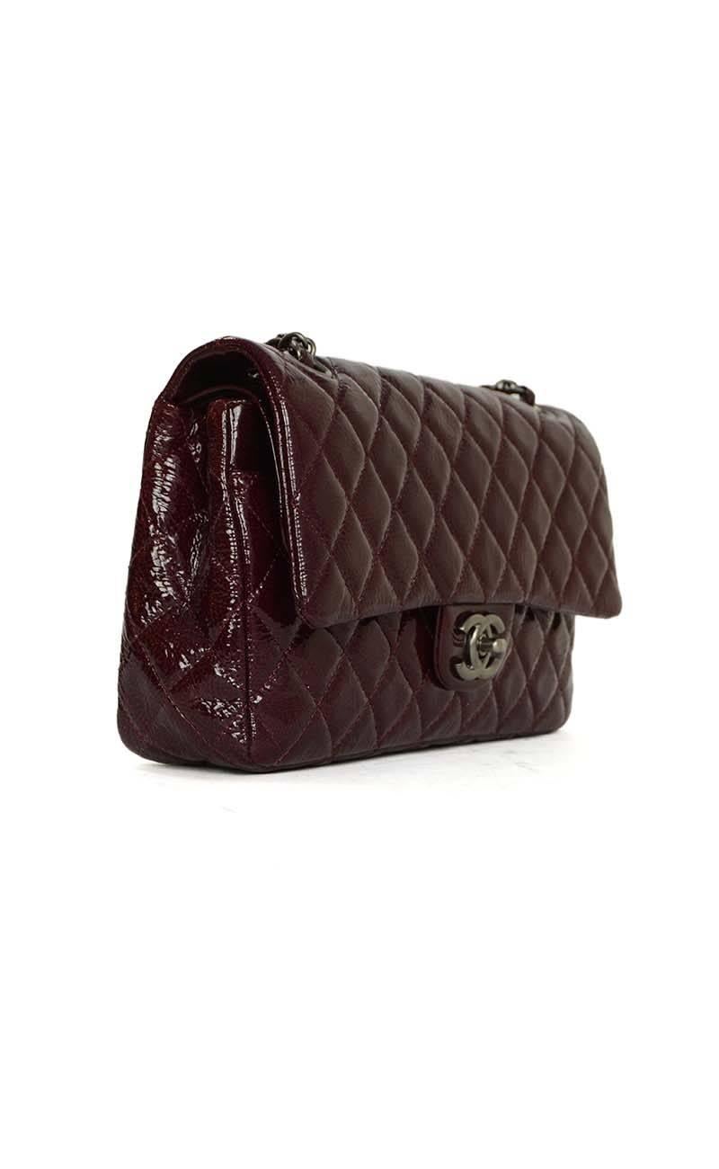Chanel Burgundy Distressed Patent Medium Classic Double Flap Bag 
Features adjustable shoulder strap
Made In: France
Year of Production: 2008
Color: Burgundy
Hardware: Ruthenium
Materials: Distressed patent leather
Lining: Burgundy