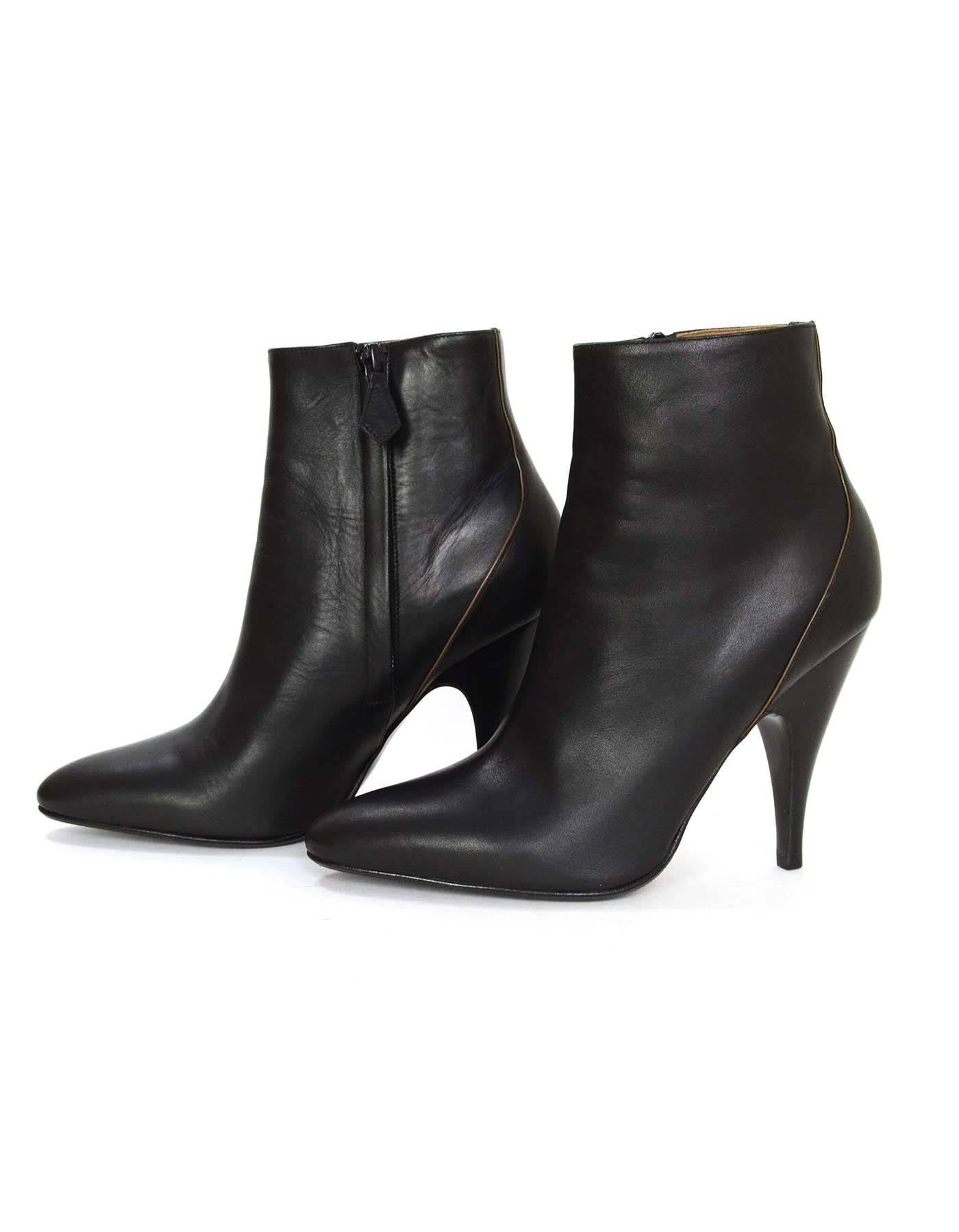 Hermes Black Leather Ankle Booties 
Made In: Italy
Color: Black
Materials: Leather
Closure/Opening: Inside ankle zipper
Sole Stamp: Hermes 37 Semelle Cuir Made in Italy
Overall Condition: Excellent pre-owned condition
Includes: Hermes box and