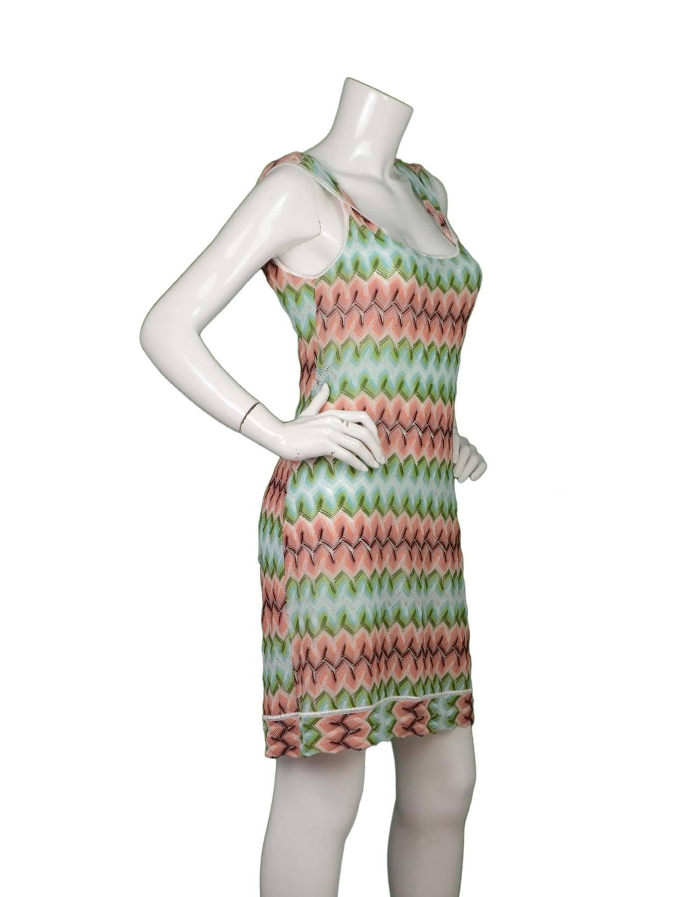 Missoni Peach & Teal Knit Sleeveless Dress 
Features twisted shoulder straps
Made In: Italy
Color: Multi-colored
Composition: 85% cotton, 15% rayon
Lining: None
Closure/Opening: Pull over
Exterior Pockets: None
Interior Pockets: