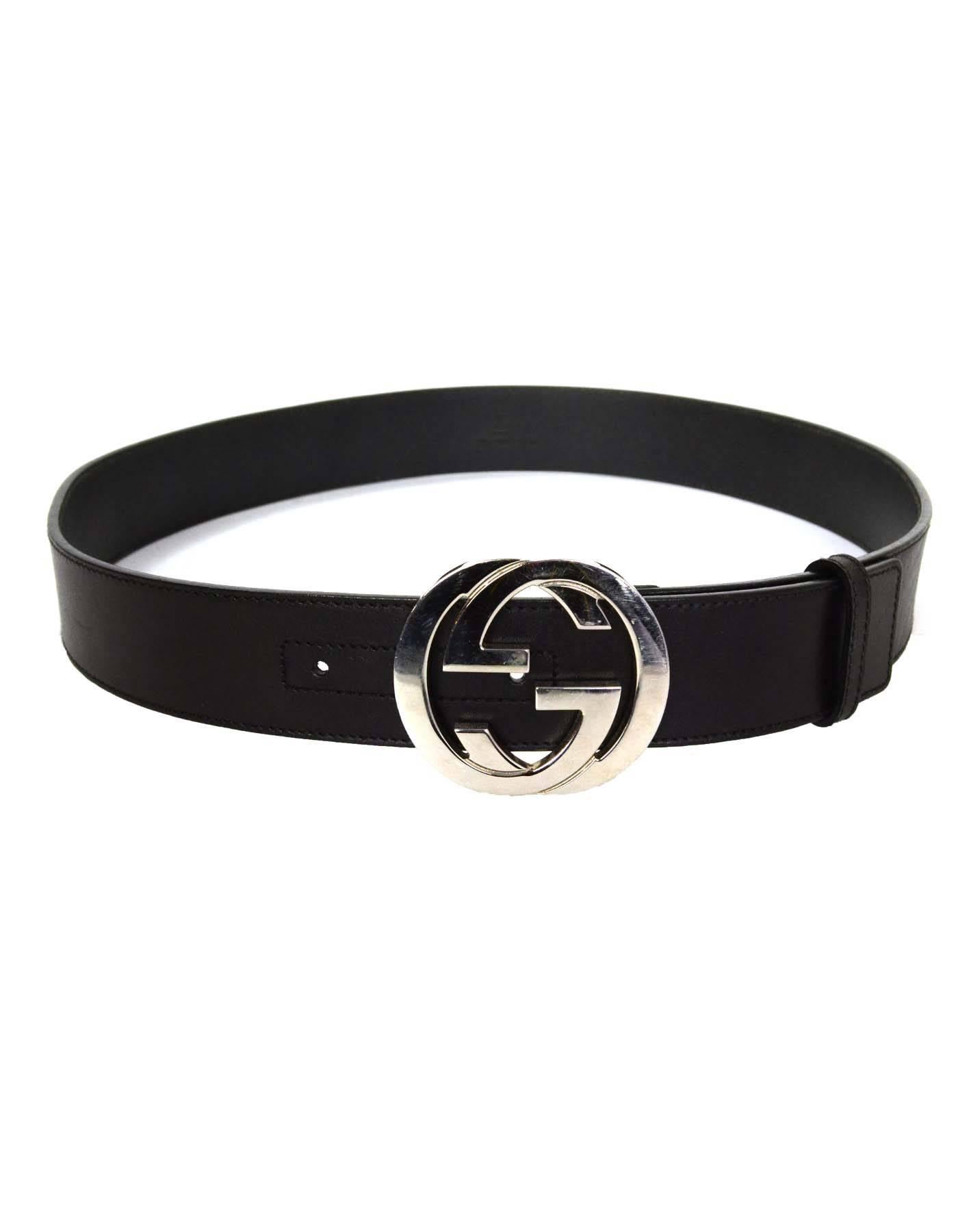 Gucci Black Leather Belt 
Features the Gucci double G logo buckle
Made In: Italy
Color: Black 
Hardware: Silvertone
Materials: Leather and metal
Closure/Opening: Stud and notch closure
Stamp: 114984-1766-90-36
Overall Condition: Excellent
