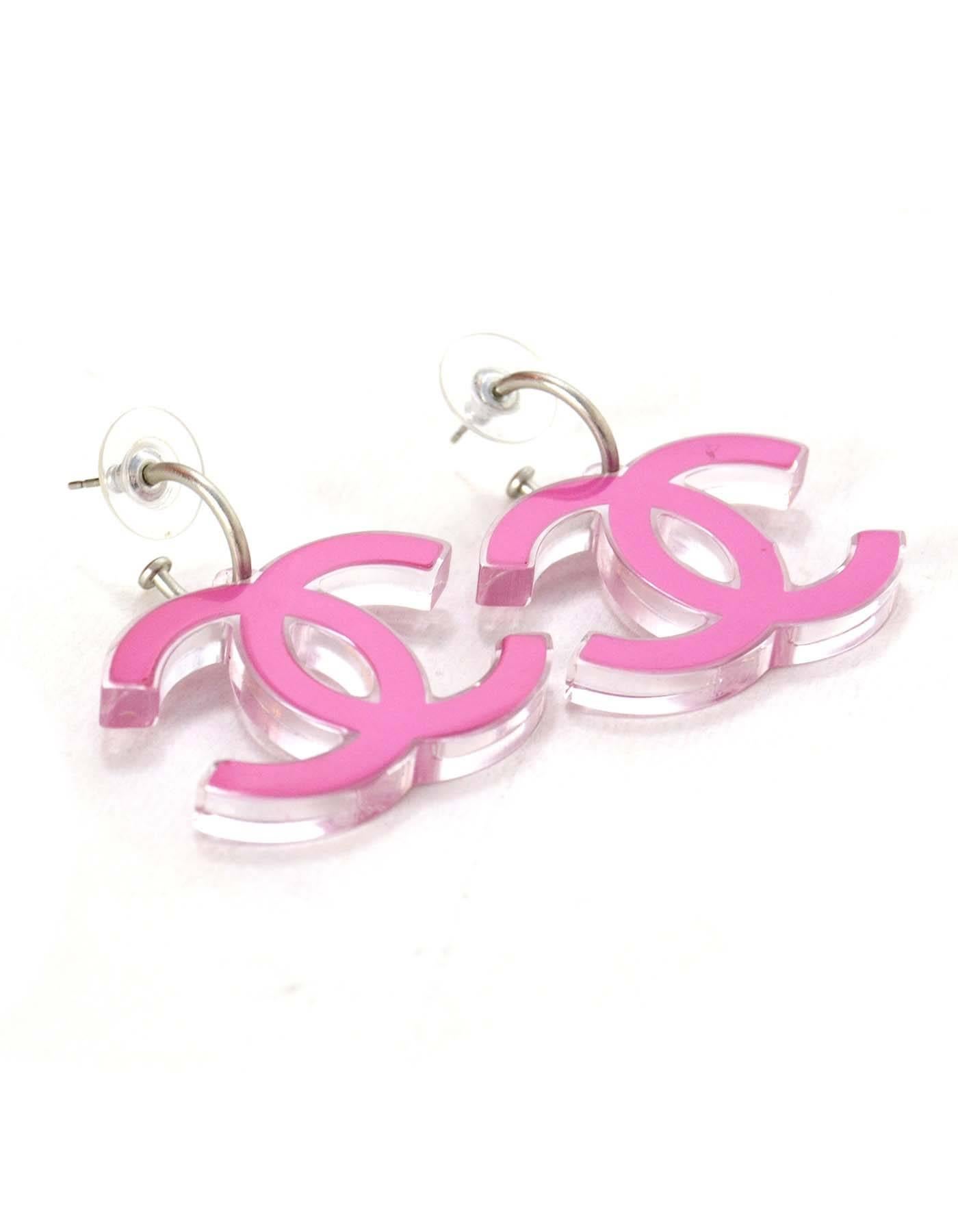 Chanel Pink Resin CC Earrings 
Made In: Italy
Year of Production: 2007
Color: Pink and silvertone
Materials: Metal and resin
Closure: Pierced back closure
Stamp: 07 CC P
Overall Condition: Excellent pre-owned condition
Measurements: