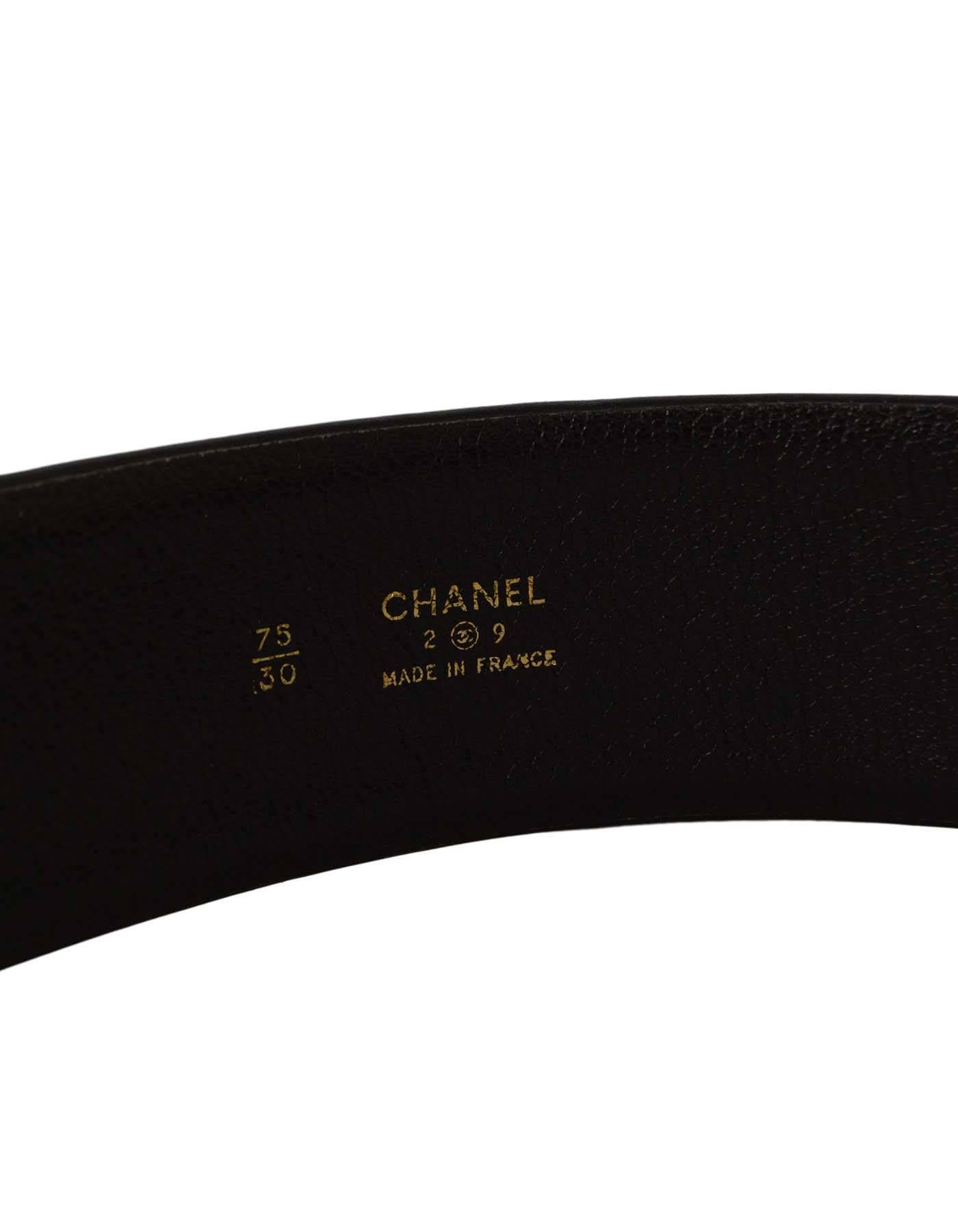 Chanel Vintage '89 Black Leather Wide Belt 
Buckle features 