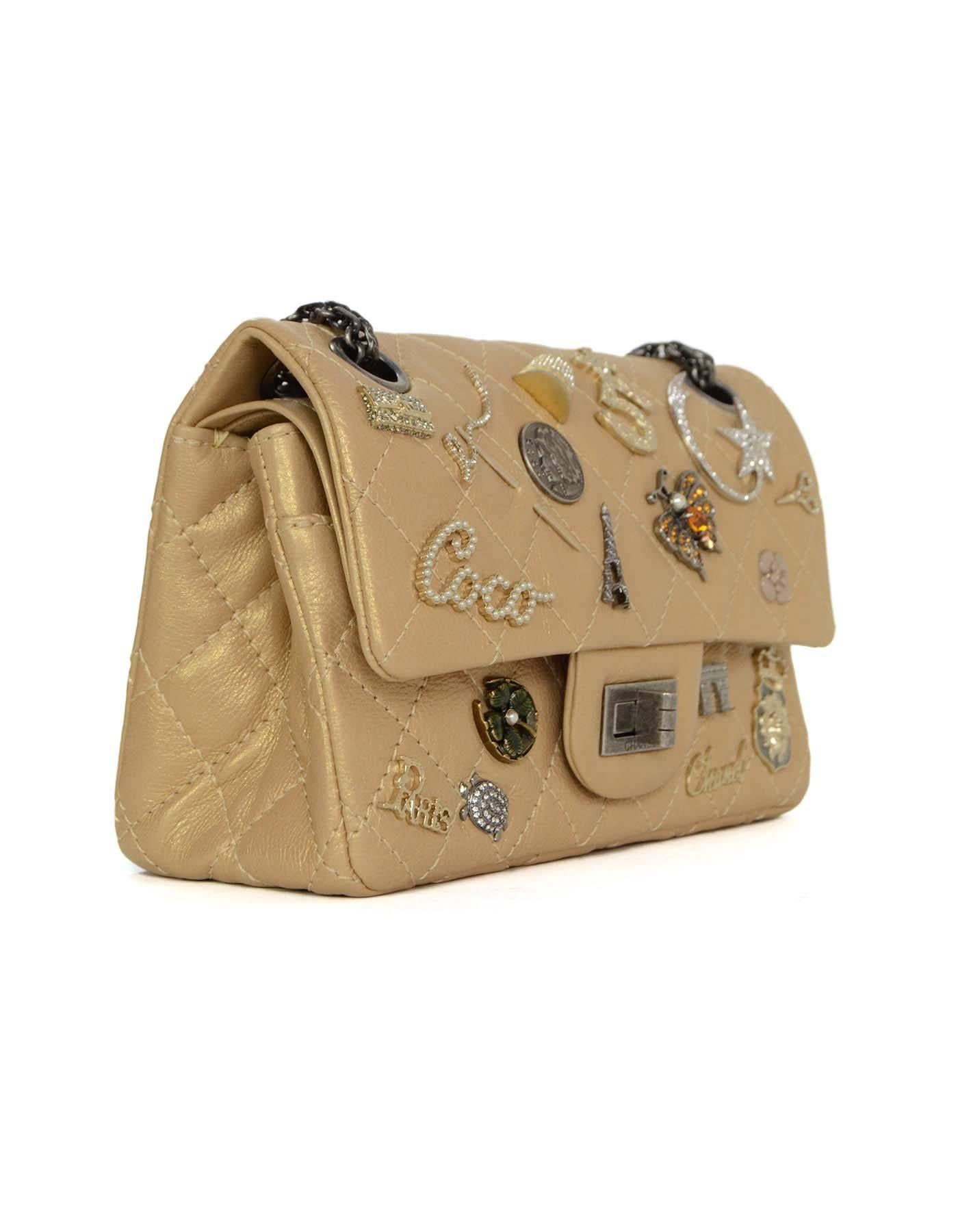 Chanel Gold Distressed Lucky Charms Re-Issue Bag 
Features goldtone, silvertone and multi-colored crystal and faux pearl charms throughout flap top and front panel of bag
Made In: France
Year of Production: 2015
Color: Gold
Hardware: Oxidized