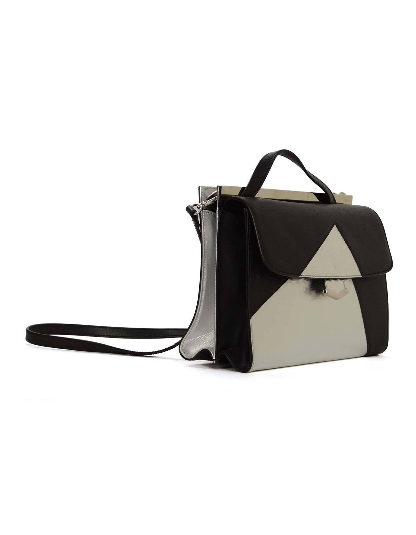 Fendi Black & Silver Textured Leather 'Demijours' Bag 
Features optional shoulder/crossbody strap
Made In: Italy
Color: Black and silver
Hardware: Silvertone
Materials: Textured leather
Lining: Black canvas
Closure/Opening: Dual opening with