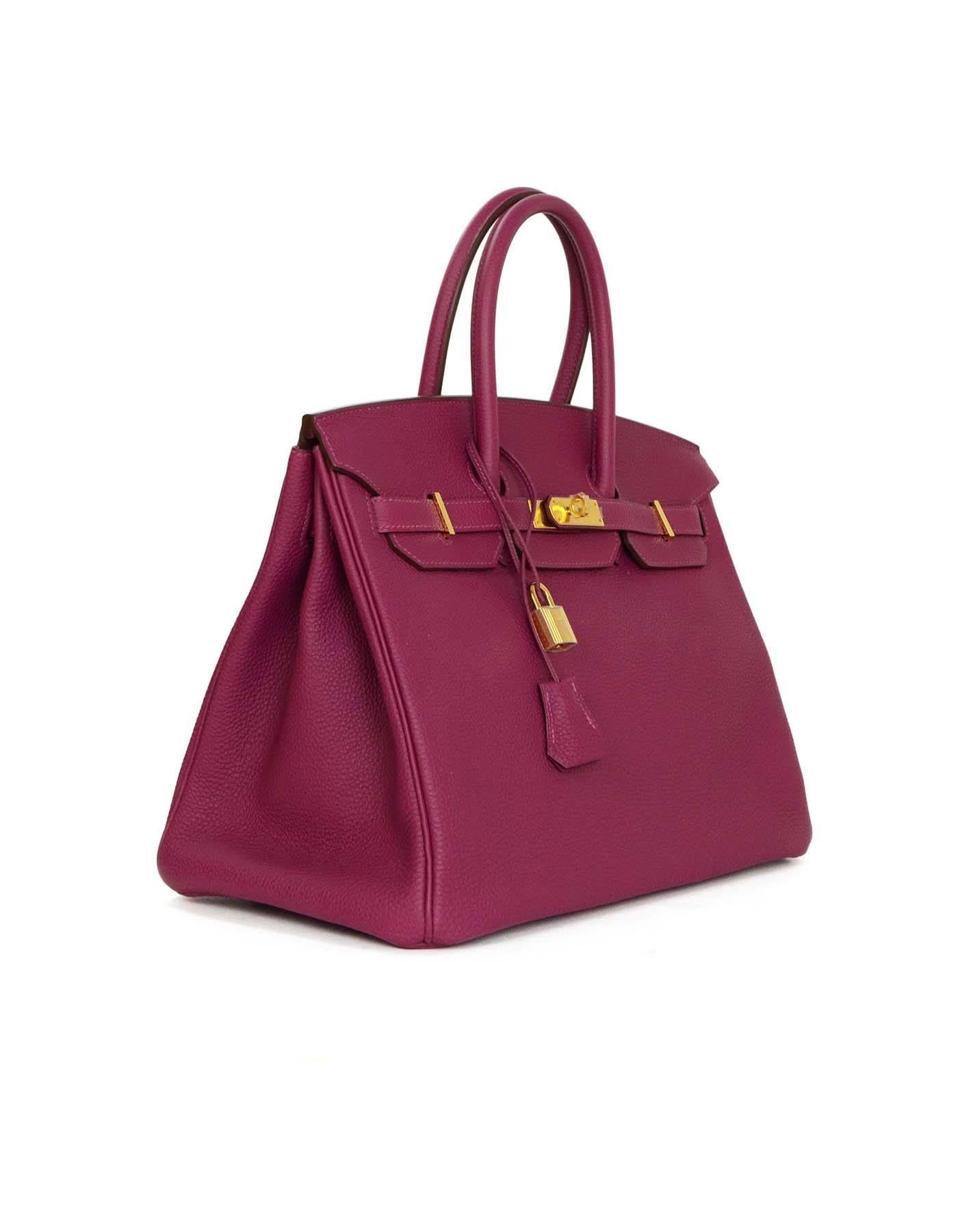 Hermes Violet Tosca Togo 35cm Birkin Bag 
Made In: France
Year of Production: 2013
Color: Violet Tosca
Hardware: Goldtone
Materials: Togo leather
Lining: Violet tosca chevre leather
Closure/Opening: Flap top with two leather arms that come
