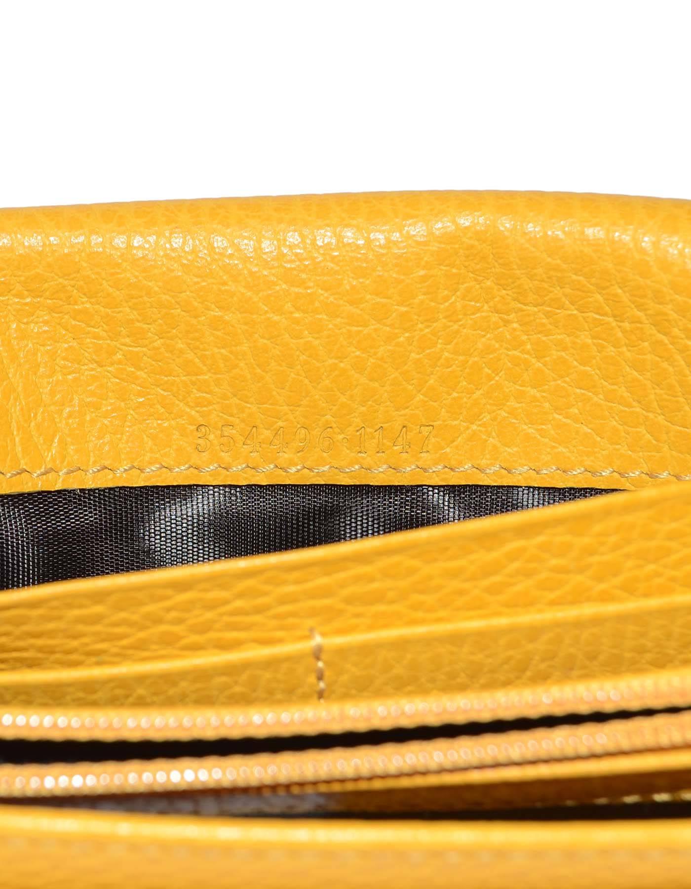 Women's Gucci Yellow Swing Leather Continental Flap Wallet GHW RT. $520