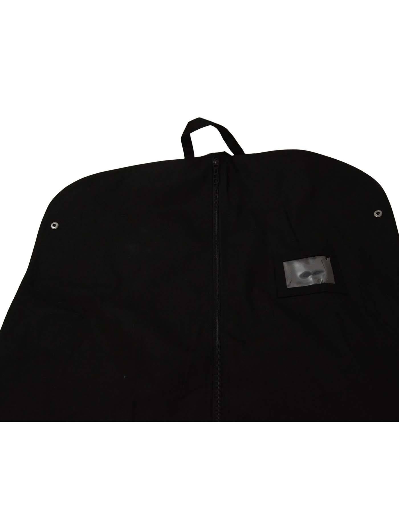 Chanel Black Canvas Garment Bag 
Features snaps to fold in half securely, handles and loop to hang on hook
Color: Black
Materials: Canvas
Closure/Opening: Center zip down
Exterior Pockets: None
Interior Pockets: None
Overall Condition: