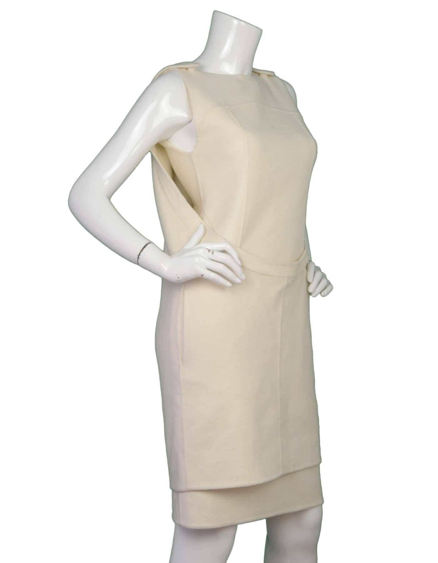 Fendi Cream Cashmere Sleeveless Shift Dress 
Features shell over layer with snaps at shoulders
Made In: Italy
Year of Production: 2014
Color: Cream
Composition: 100% cashmere
Lining: Cream, 100% silk 
Closure/Opening: Top layer- shoulder