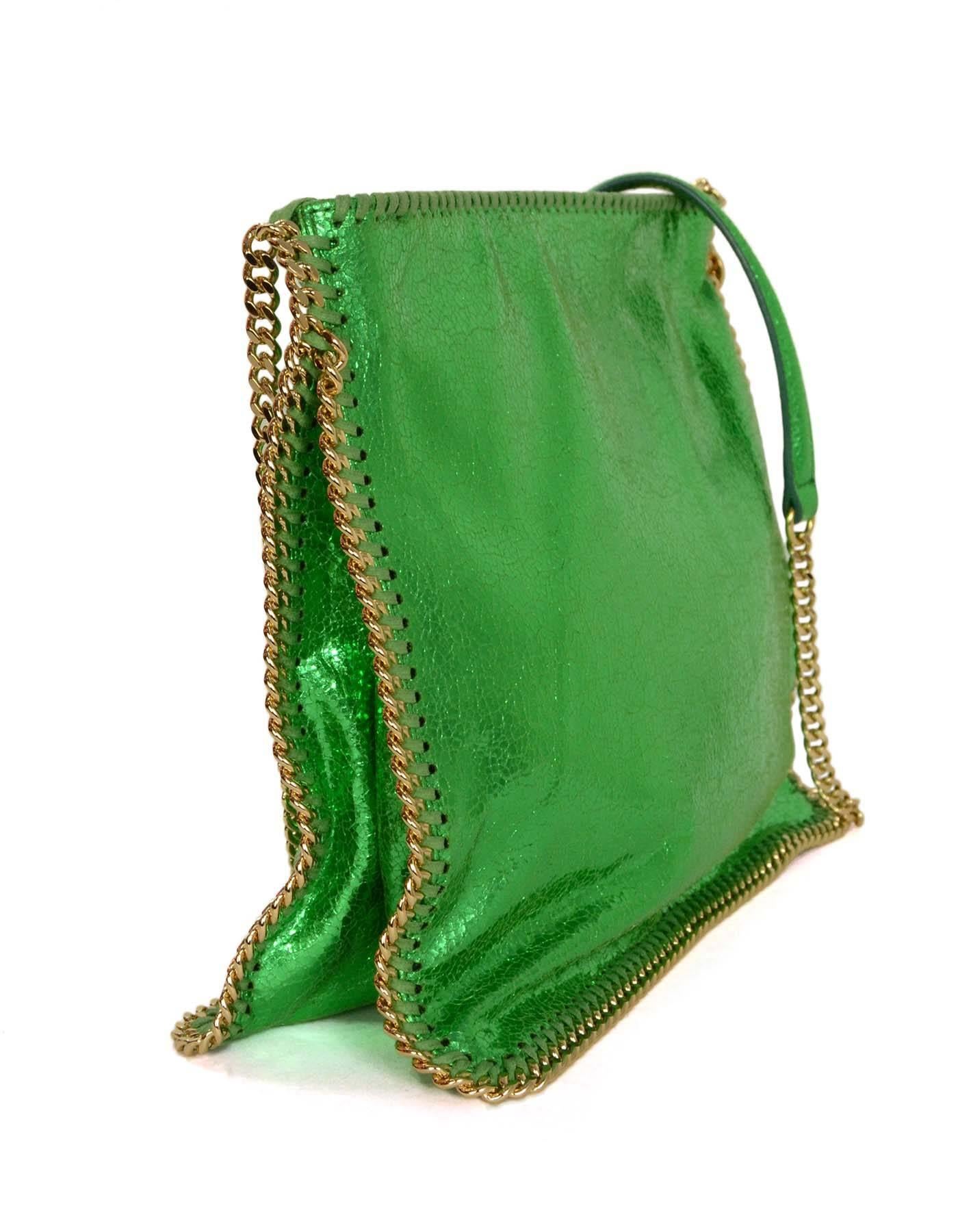 Stella McCartney Metallic Green Falabella Crossbody Bag 
Features goldtone chain around detailing
Made In: Italy
Color: Peacock green
Hardware: Goldtone
Materials: Vegan leather
Lining: Black nylon
Closure/Opening: Zip across top
Exterior