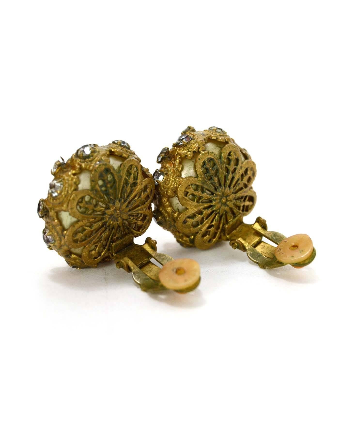 Chanel Vintage '50s Pearl & Crystal Clip On Earrings 
Features intricate detailing throughout goldtone portion

Made In: France
Year of Production: 1950's
Color: Goldtone and white
Materials: Metal, crystal and faux pearl
Closure: Clip