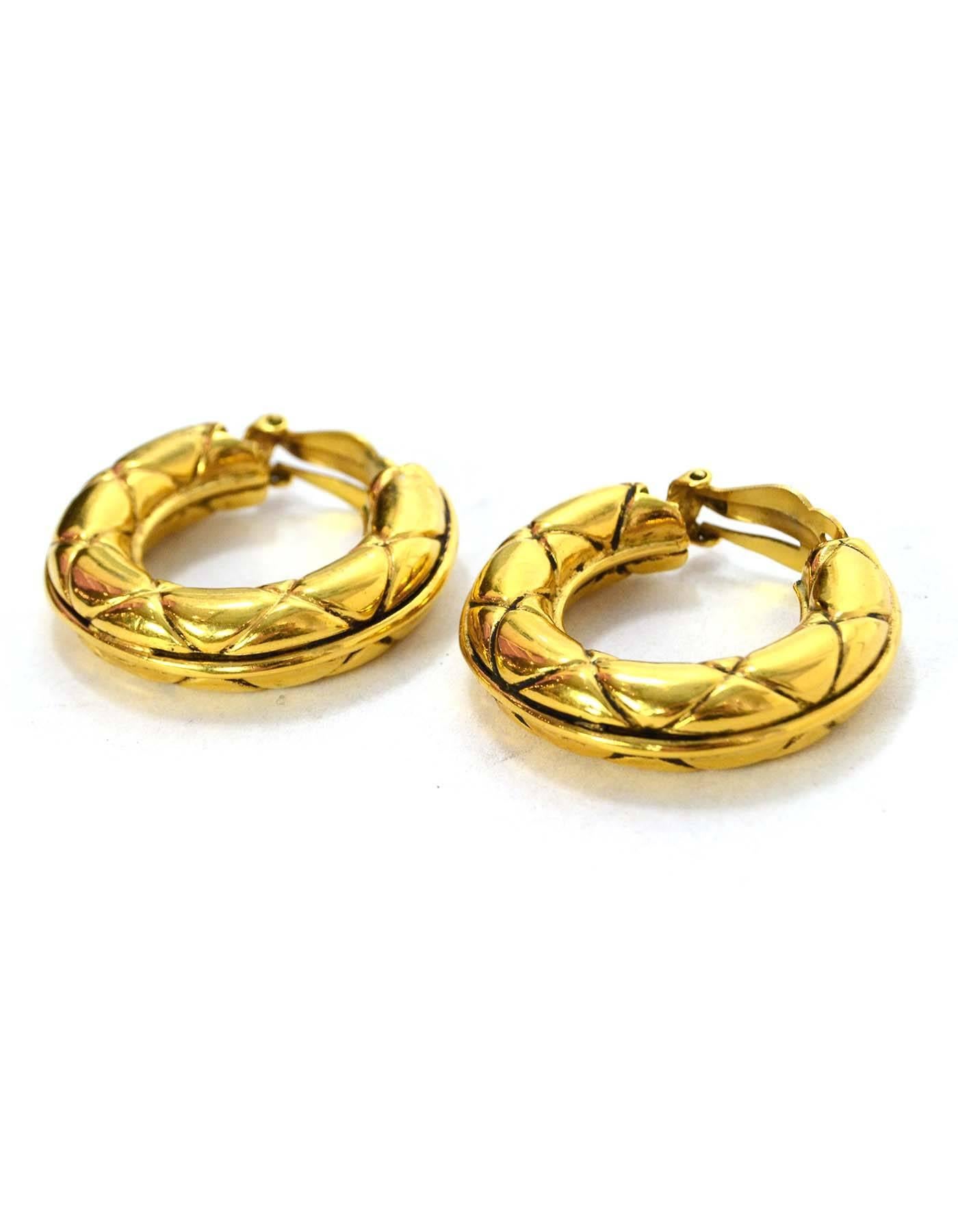 Chanel Gold Quilted Hoop Clip On Earrings
Color: Goldtone
Materials: Metal
Closure: Clip on
Overall Condition:  Excellent vintage, pre-owned condition with the exception of missing stamp
Measurements: 
Length: 1.35”
Width: .5