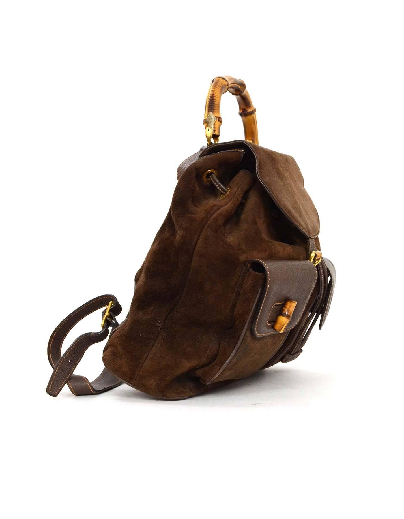 Gucci Brown Leather Suede Combo Backpack GHW
Features adjustable strap, tan contrast stitching, bamboo handle, gold hardware
Made in: Italy
Color: Brown
Hardware: Goldtone
Materials: Leather/ Suede
Lining: Mustard yellow