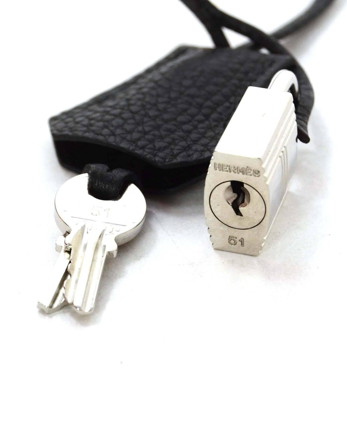 Hermes Black Togo Clochette & Palladium Padlock 
Color: Black and silvertone
Materials: Togo leather and palladium metal
Closure: Padlock with two keys
Stamp: Padlock- Hermes 51
Overall Condition: Excellent pre-owned condition
Includes: Hermes