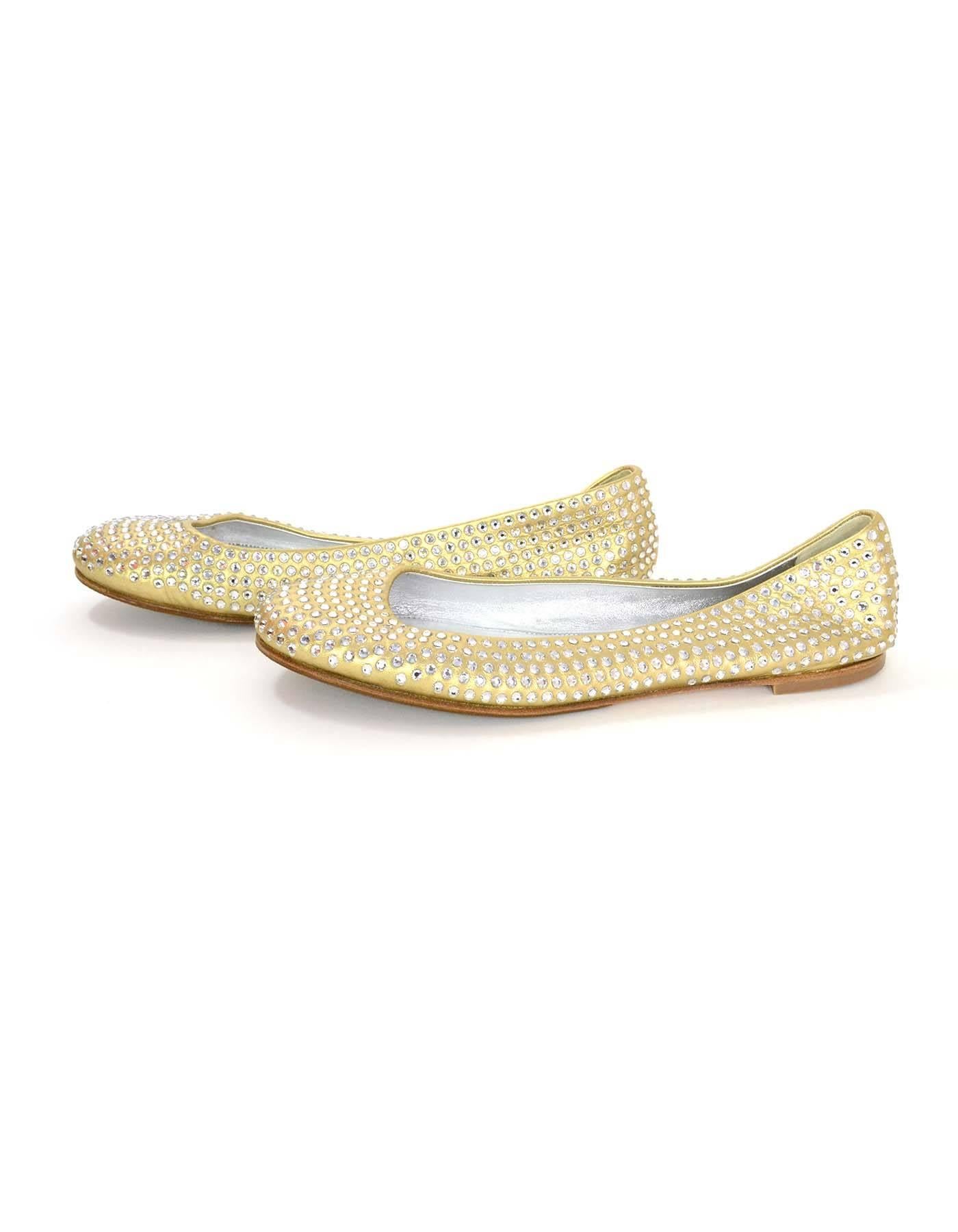 Giuseppe Zanotti Metallic Gold Leather & Crystal Embellished Flats 
Features Swarovski crystals throughout
Made In: Italy
Color: Metallic gold
Materials: Leather and crystal
Closure/Opening: Slip on
Sole Stamp: Vero Cuoio Made in Italy